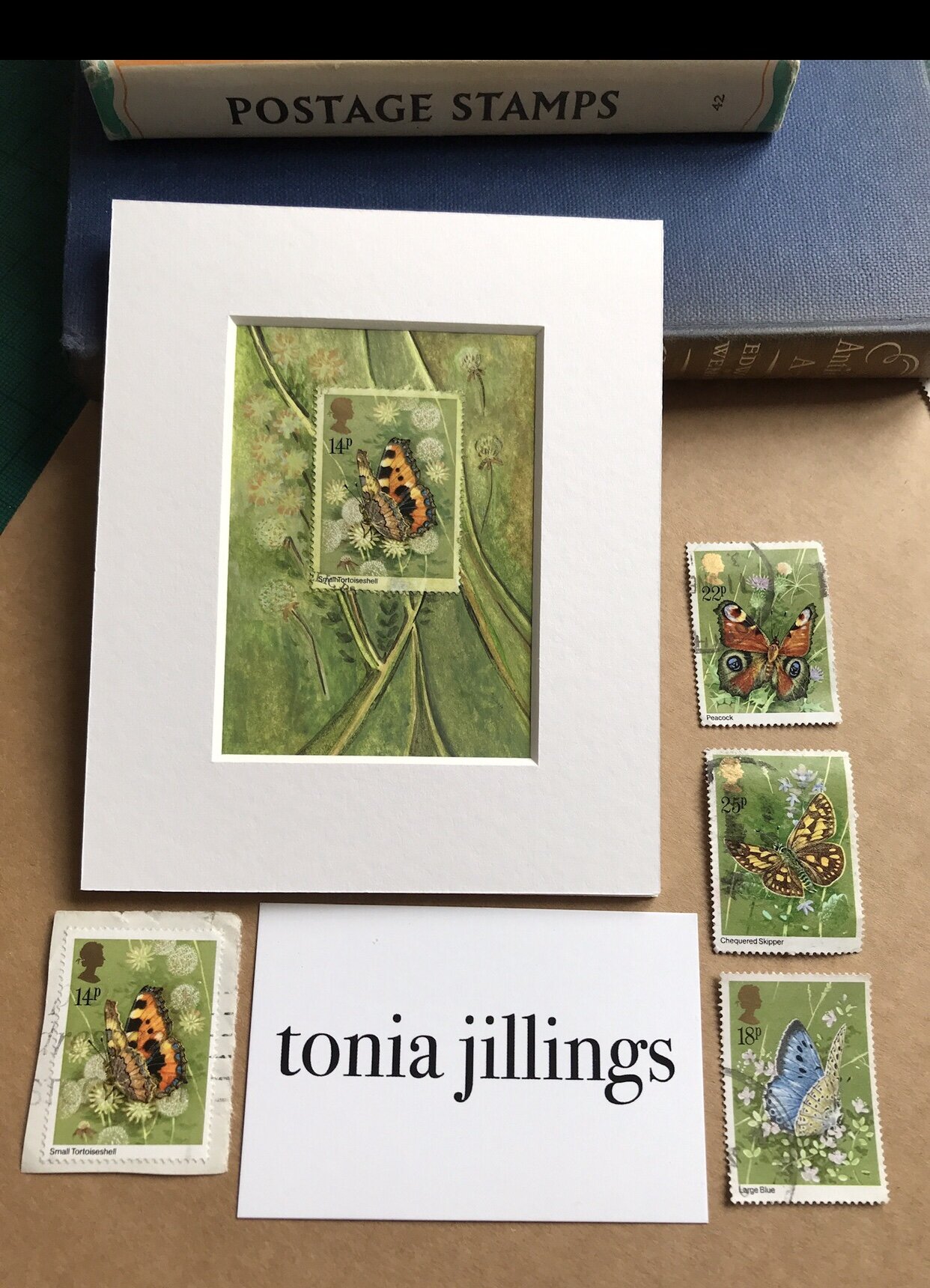 Small Tortoiseshell Butterfly Postage Stamp Art made with a real stamp and green watercolour paint