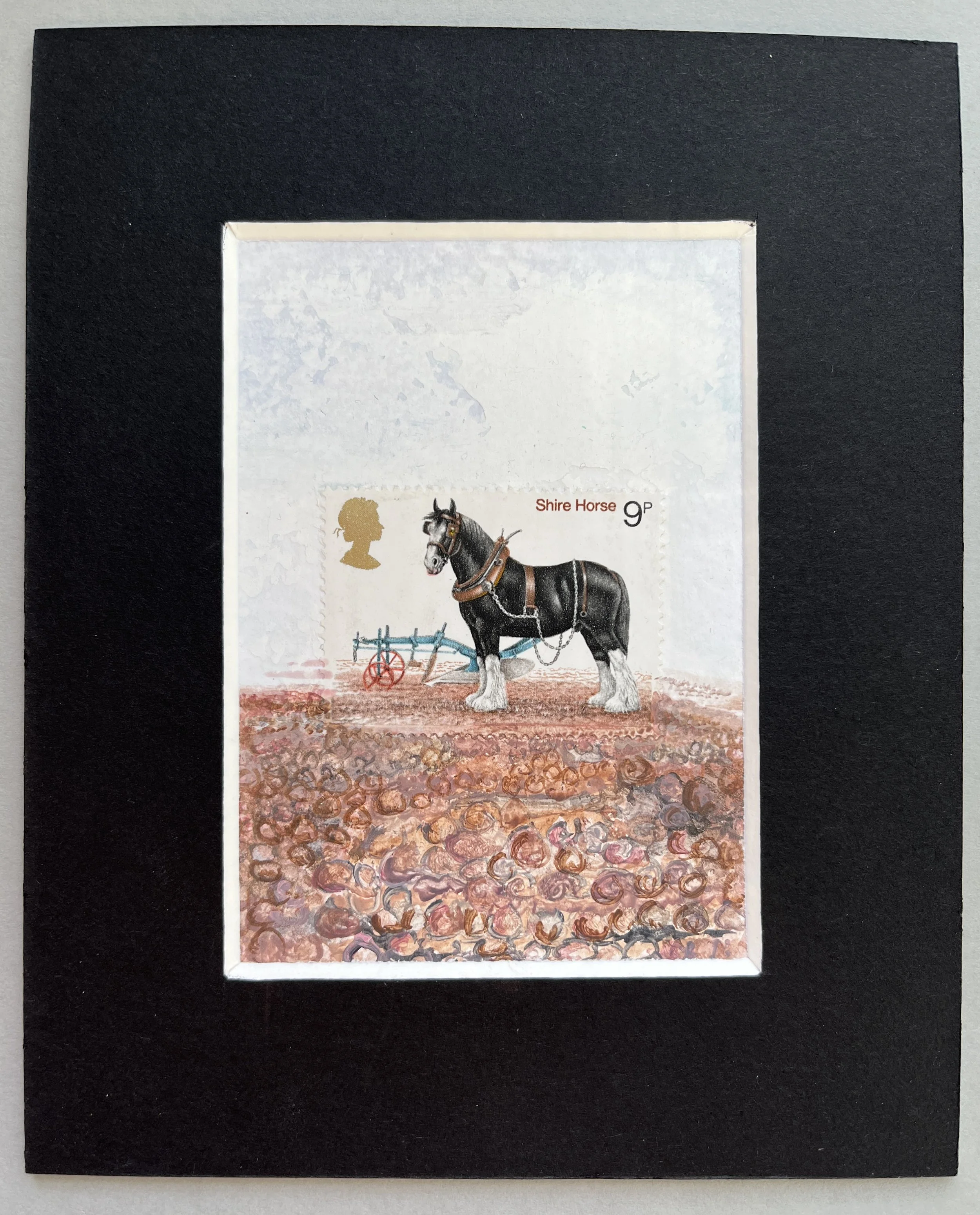 Shire Horse Postage Stamp Art pink ground beneath the horses feet and a blue plough in the background framed in black
