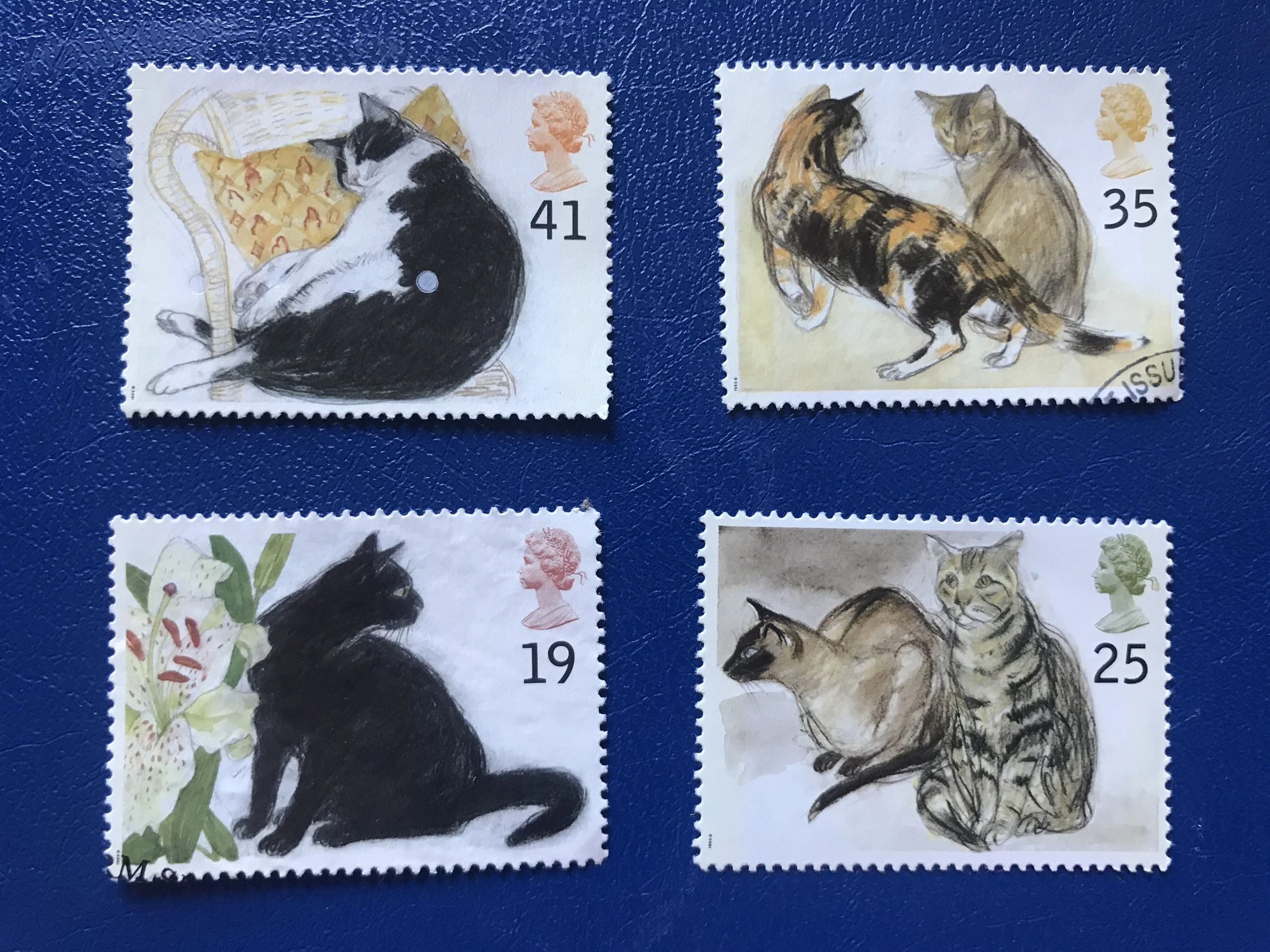 four Royal Mail cat postage stamps issued in 1995