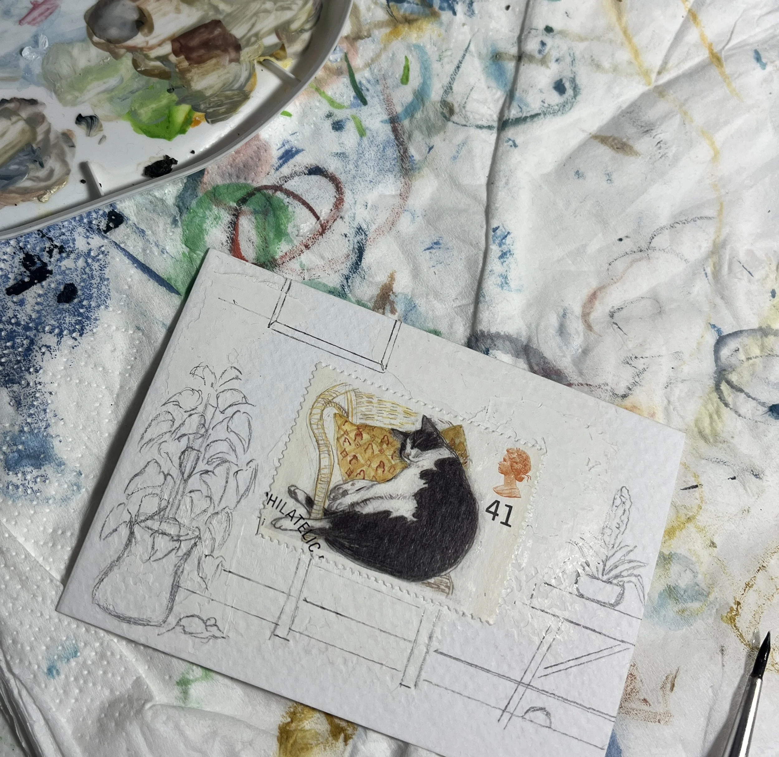 black and white cat asleep on a chair with pot plants around it and a little mouse with a mouse hole sneaking around while the cat sleeps