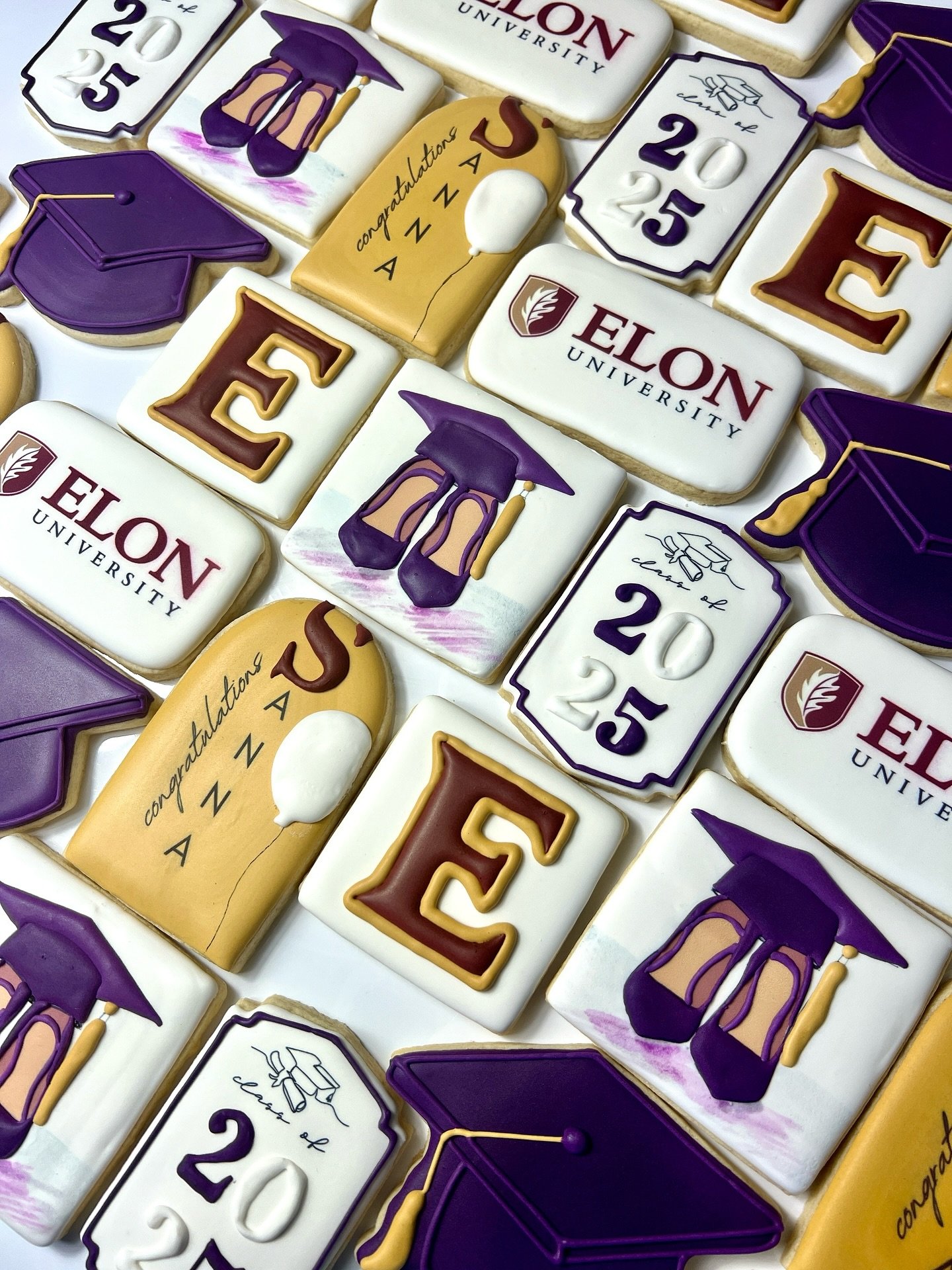 Most of our CMS high school students are graduating this week-my decorating hand is about to fall off :-). They are worth it though! From Porter Ridge Pirate to Elon Phoenix- Congrats Sanaa!
#graduation #graduationcookies #customcookies #cltbakery