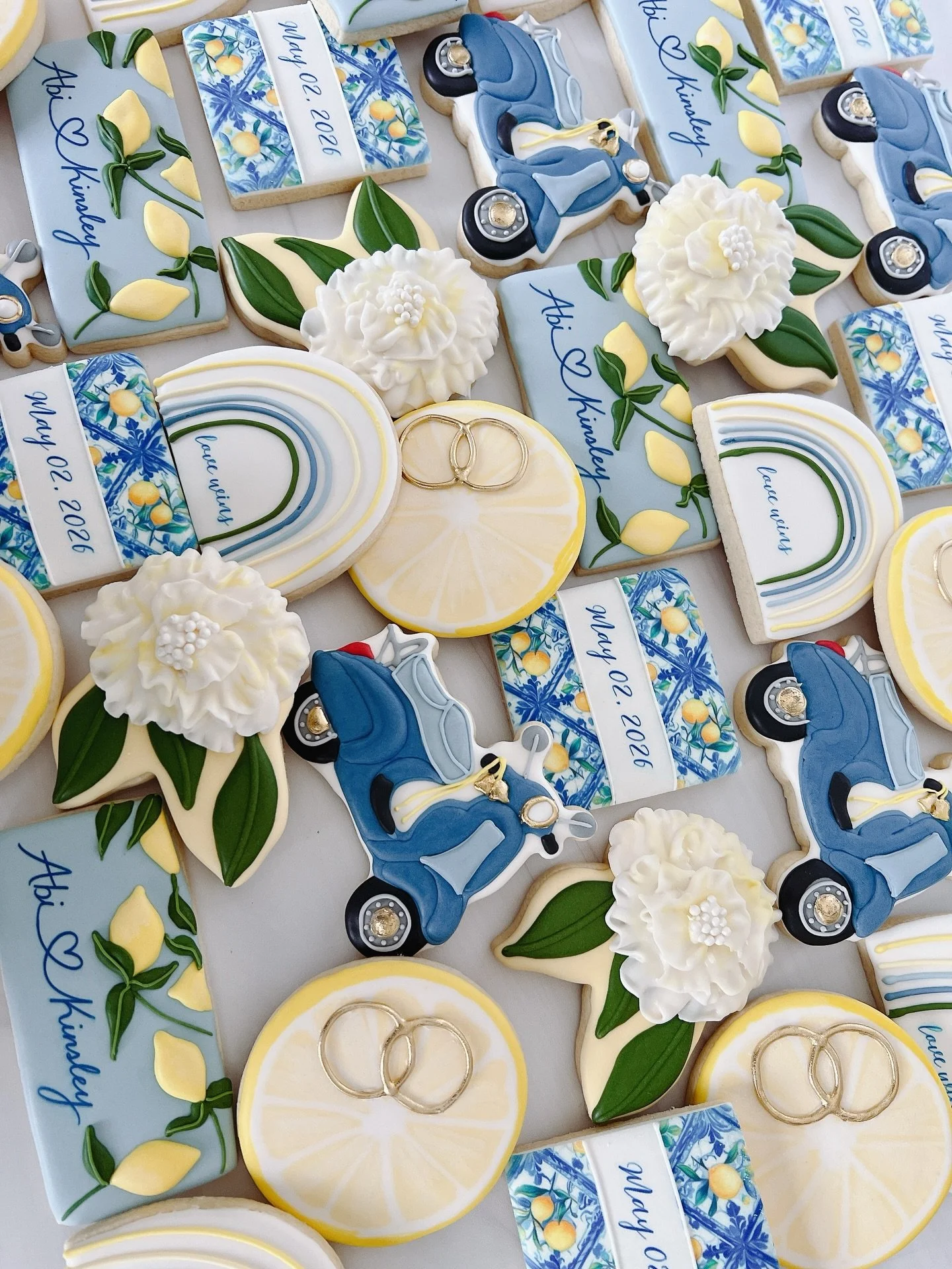 I love a Mediterranean &amp; lemon themed wedding set but how stinking cute is that little scooter?!?! 💙💙💙Congrats Abi &amp; Kinsley!

#customcookies #bridalshower #weddingcookies  #cltbakery