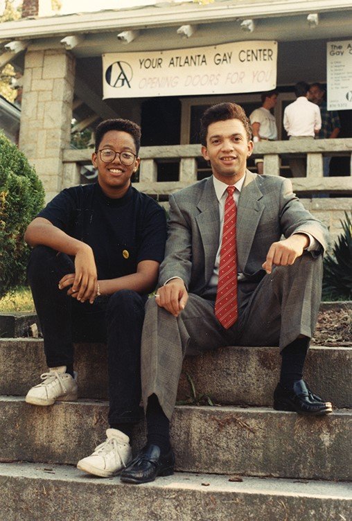  Two LGBTQ Atlantans, Moorylien Jenkins and David Kelly, sitting on the steps of the Atlanta Gay Center on National Coming Out Day (October 14th) in 1989.  Photo credit: , Atlanta Journal-Constitution Photographic Archives. Special Collections and Ar