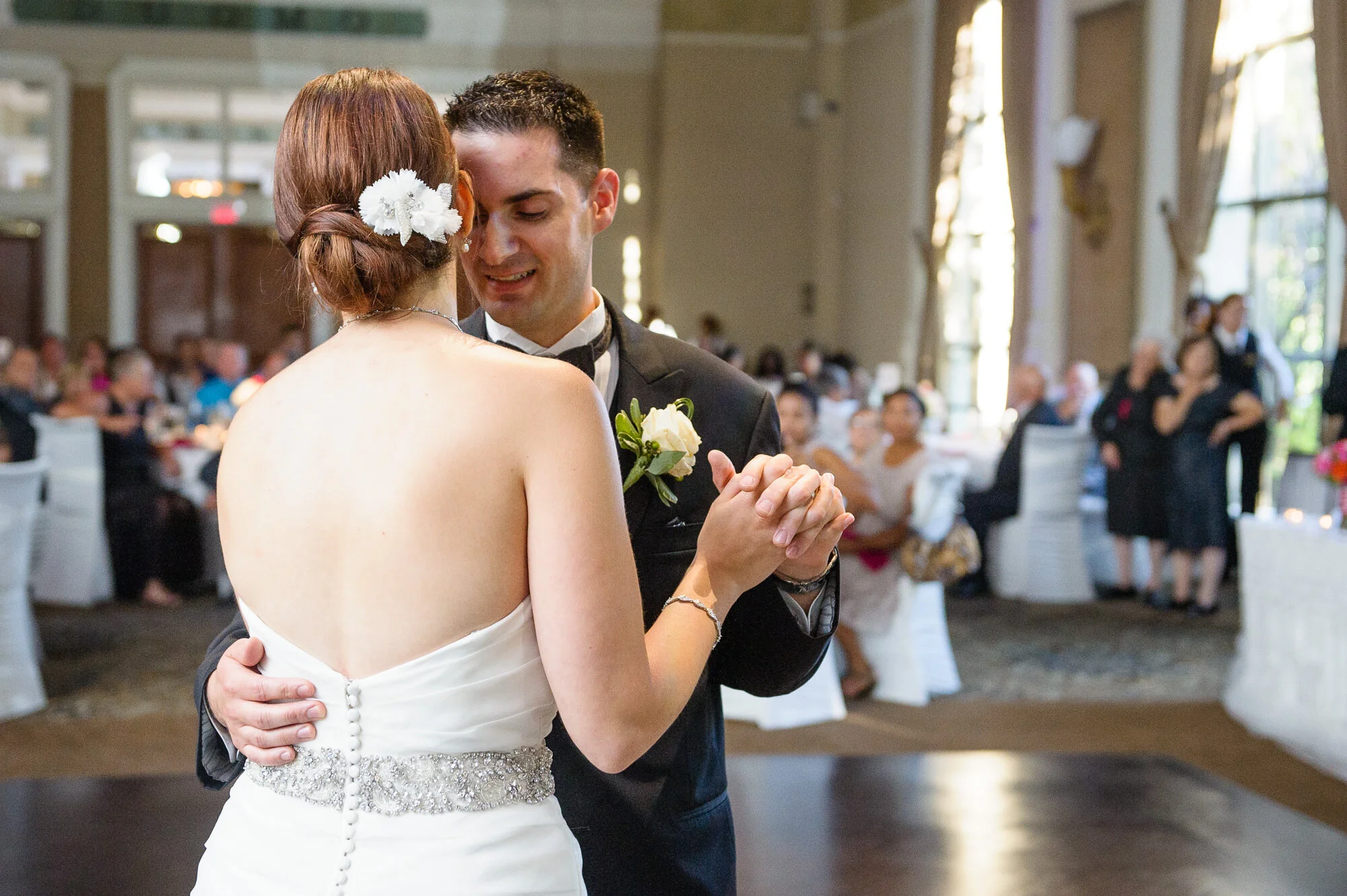 Bride and groom dancing at a wedding reception