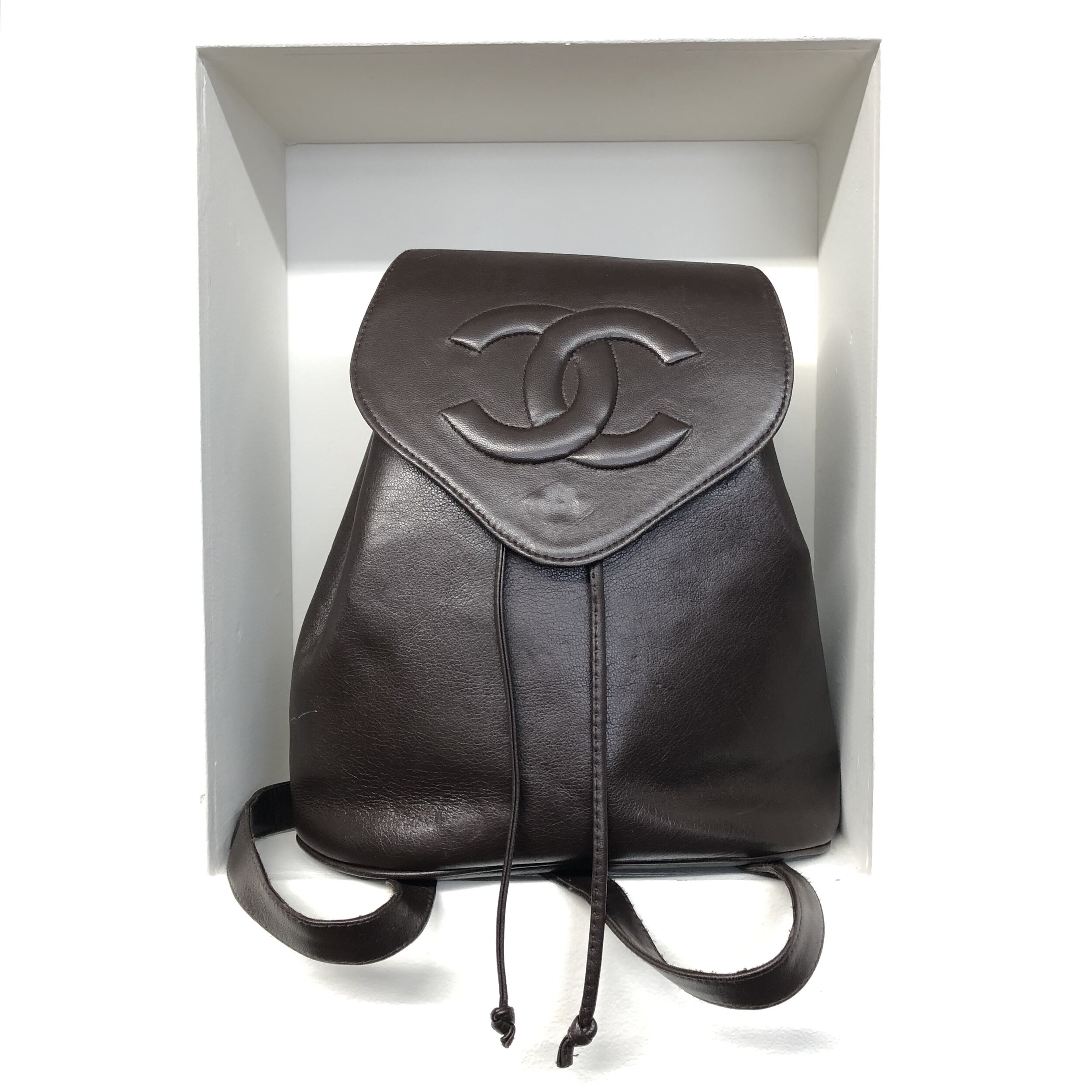 chanel purse backpack leather