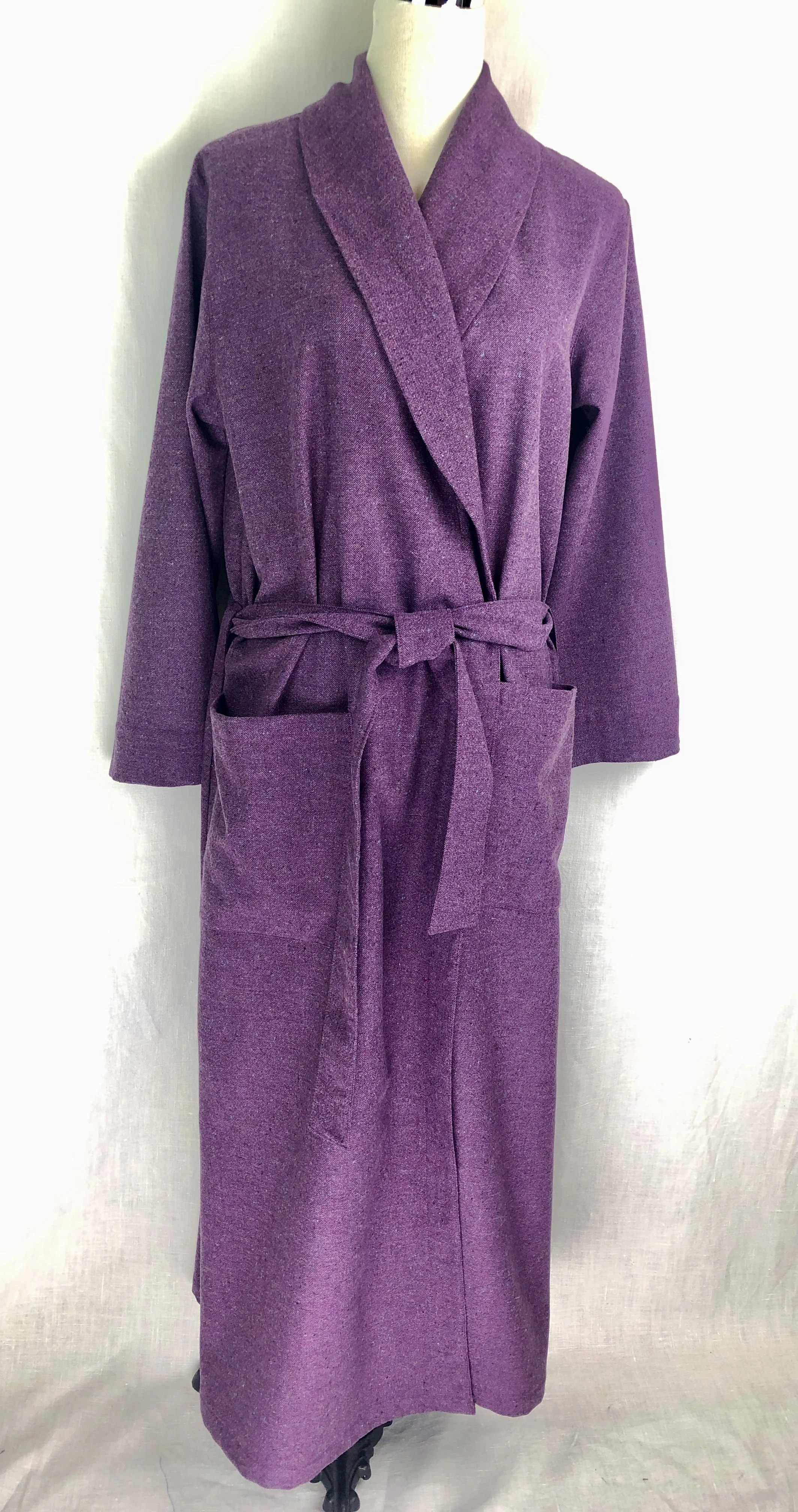 Purple wool dressing robe with a belt tied at the waist, displayed on a mannequin.