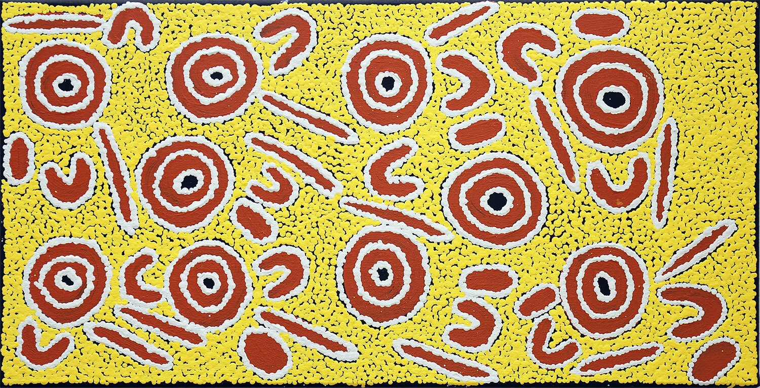 Isobelle Spencer Napaljarri Wardapi Jukurrpa ,  #10942-20 310 x 610 mm Acrylic on Linen  $220   'This painting is about the way women hunt Wardapi – that sand goanna. He digs holes in the dunes, makes his nest deep inside. Many of the holes all join up. Women hunt Wardapi in the dunes by digging out the holes. Sometimes cover one, and Wardapi runs out other one. Need to hunt him together. Find all the holes. Dig them at the same time. Someone going to get him that way.’   ENQUIRE