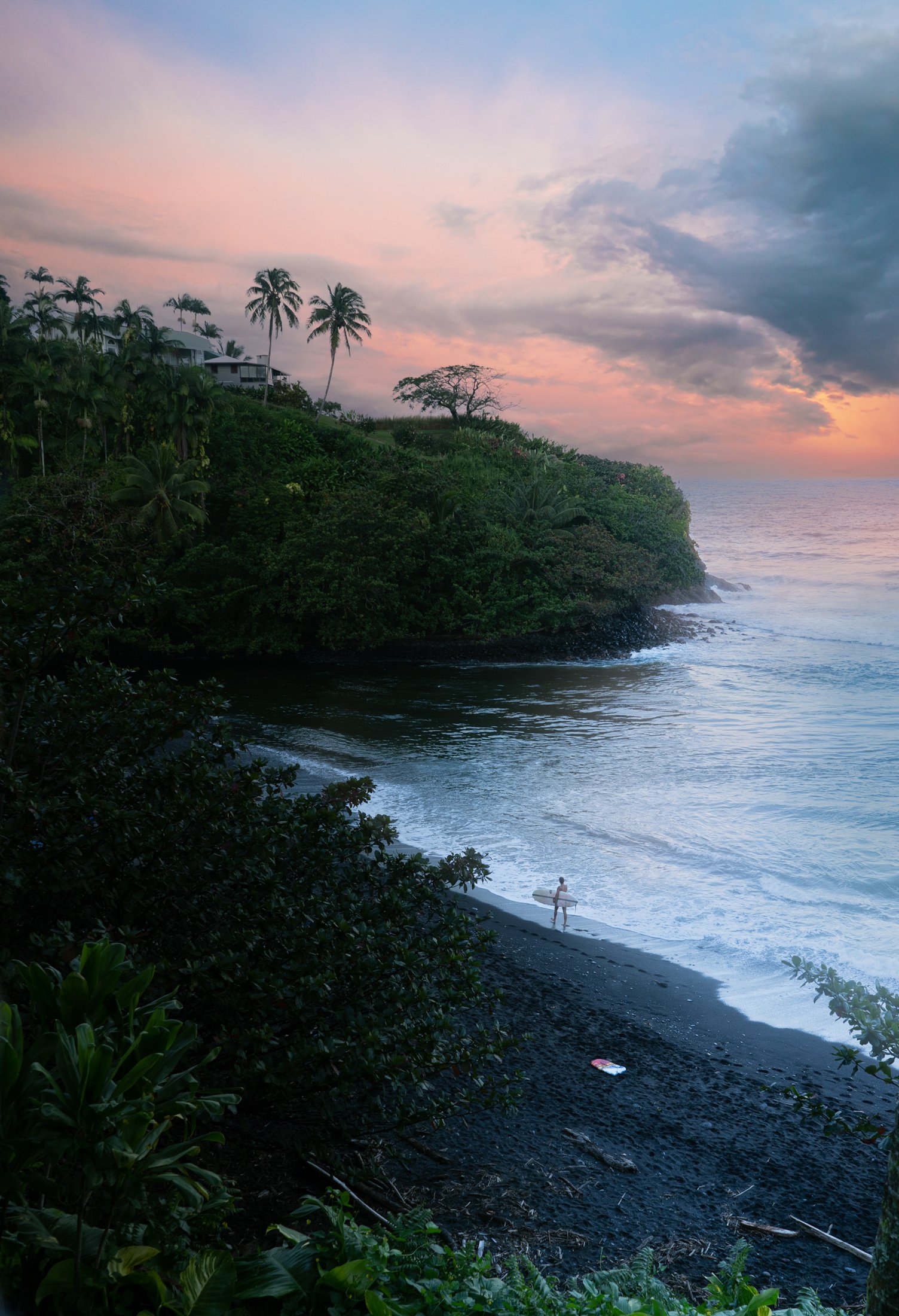 Honoli'i-man-waliking-with-surfboard-.jpg