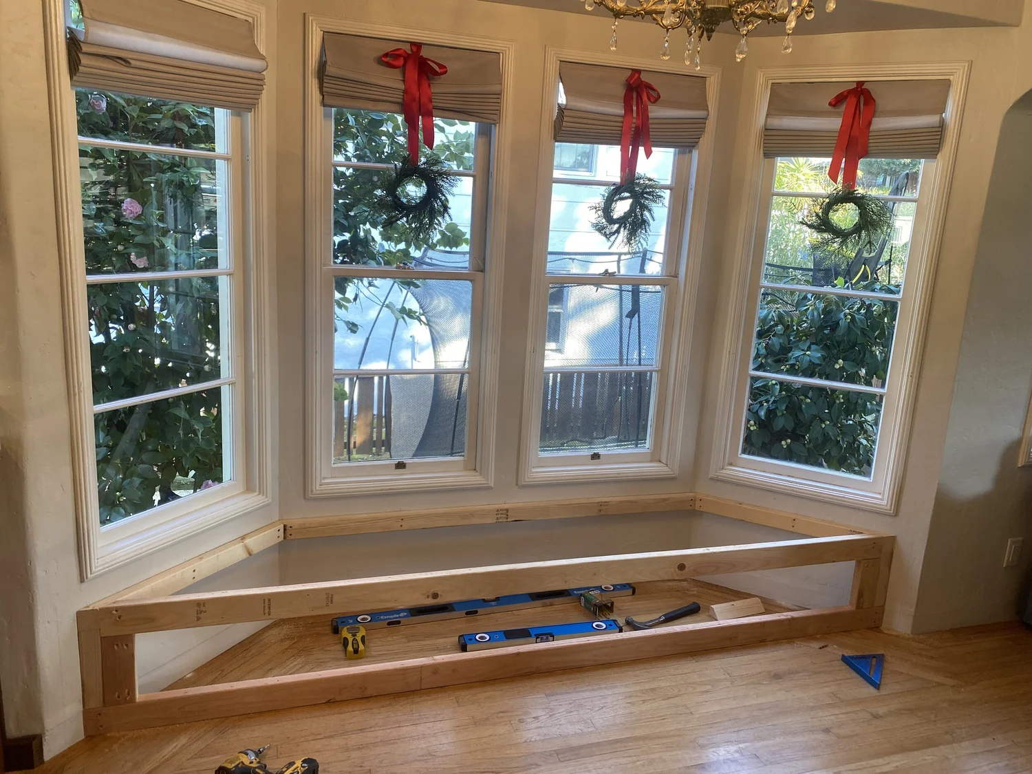 Bay window seating area before construction, framing exposed