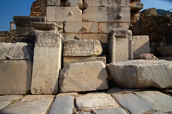 Greek inscriptions on the street right near the Public Bath.