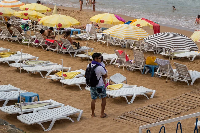 father-baby-beach-umbrella