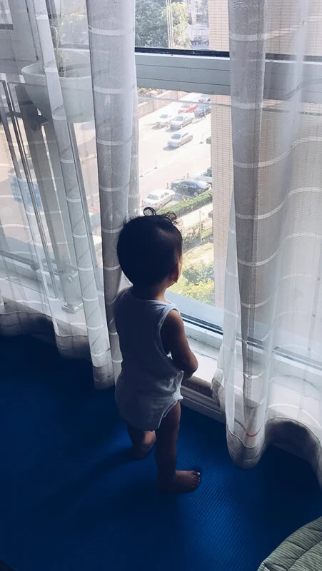 Baby-Looking-Out-Window