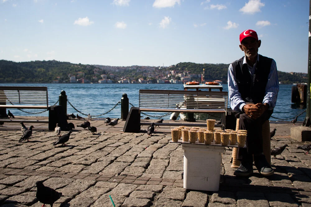 Man-selling-birdseed