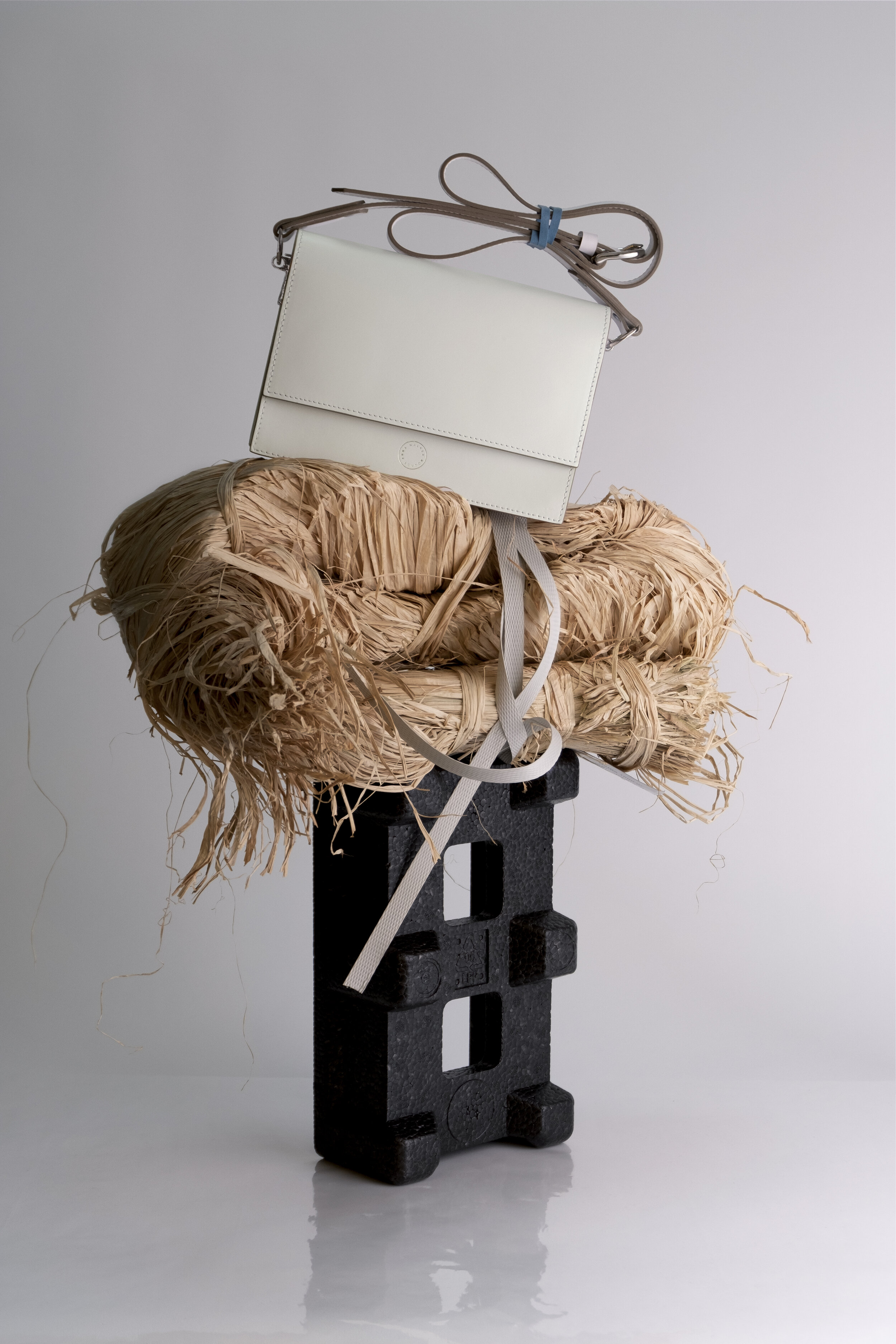 albertine-tucknott-stylist-still-life-leather-bag-white-sculpture.jpg