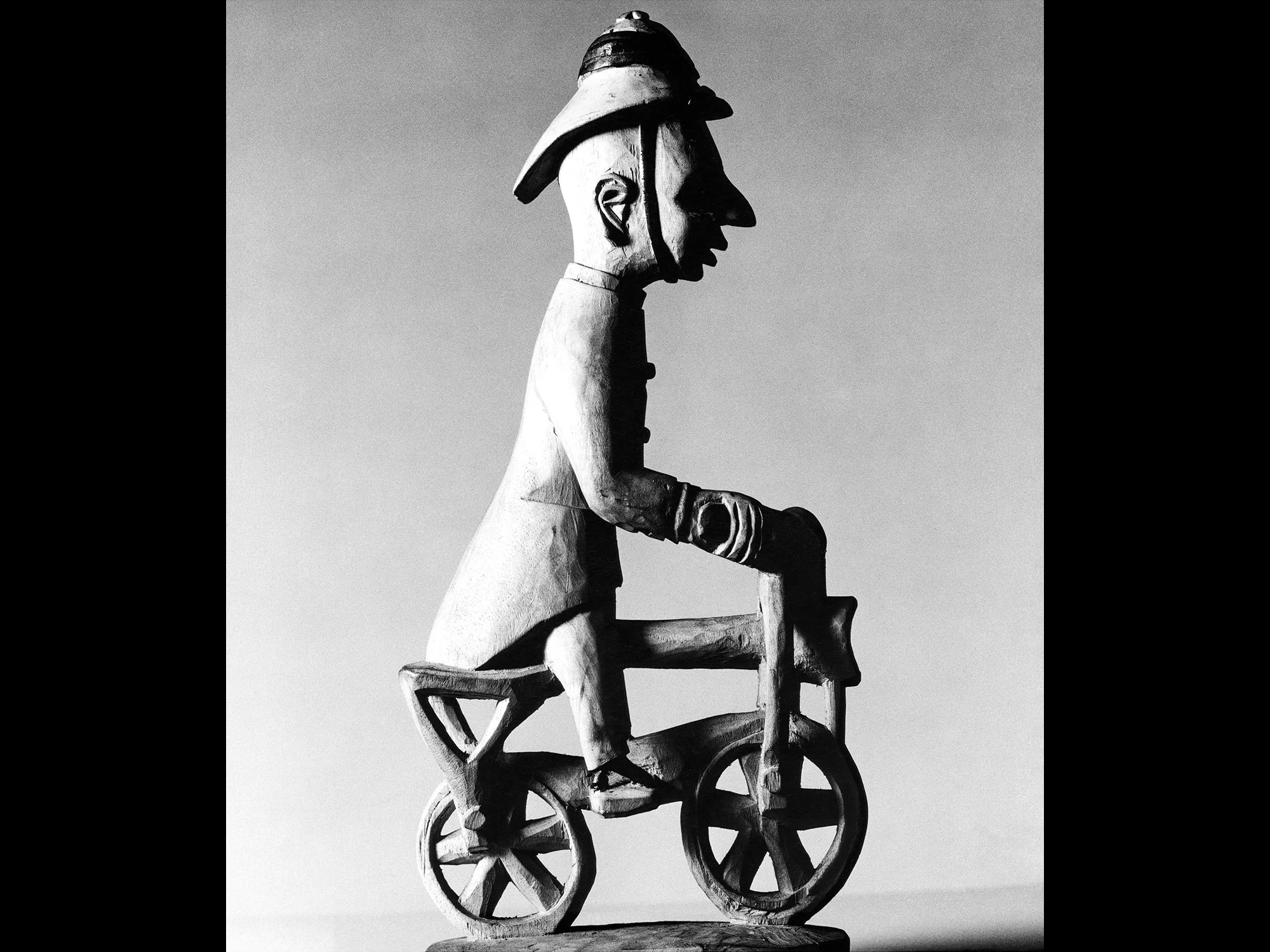 African-Image---Colonial-Policeman-on-his-Bike-RT-1500-Format-SqSp.jpg