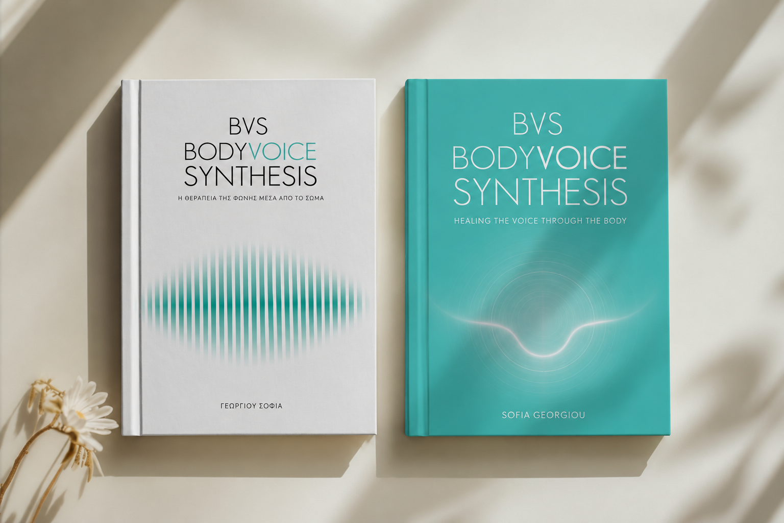 Two books titled "BVS Body Voice Synthesis" with one in Greek and the other in English, placed on a white surface; the Greek version is on the left, and the English version is on the right.