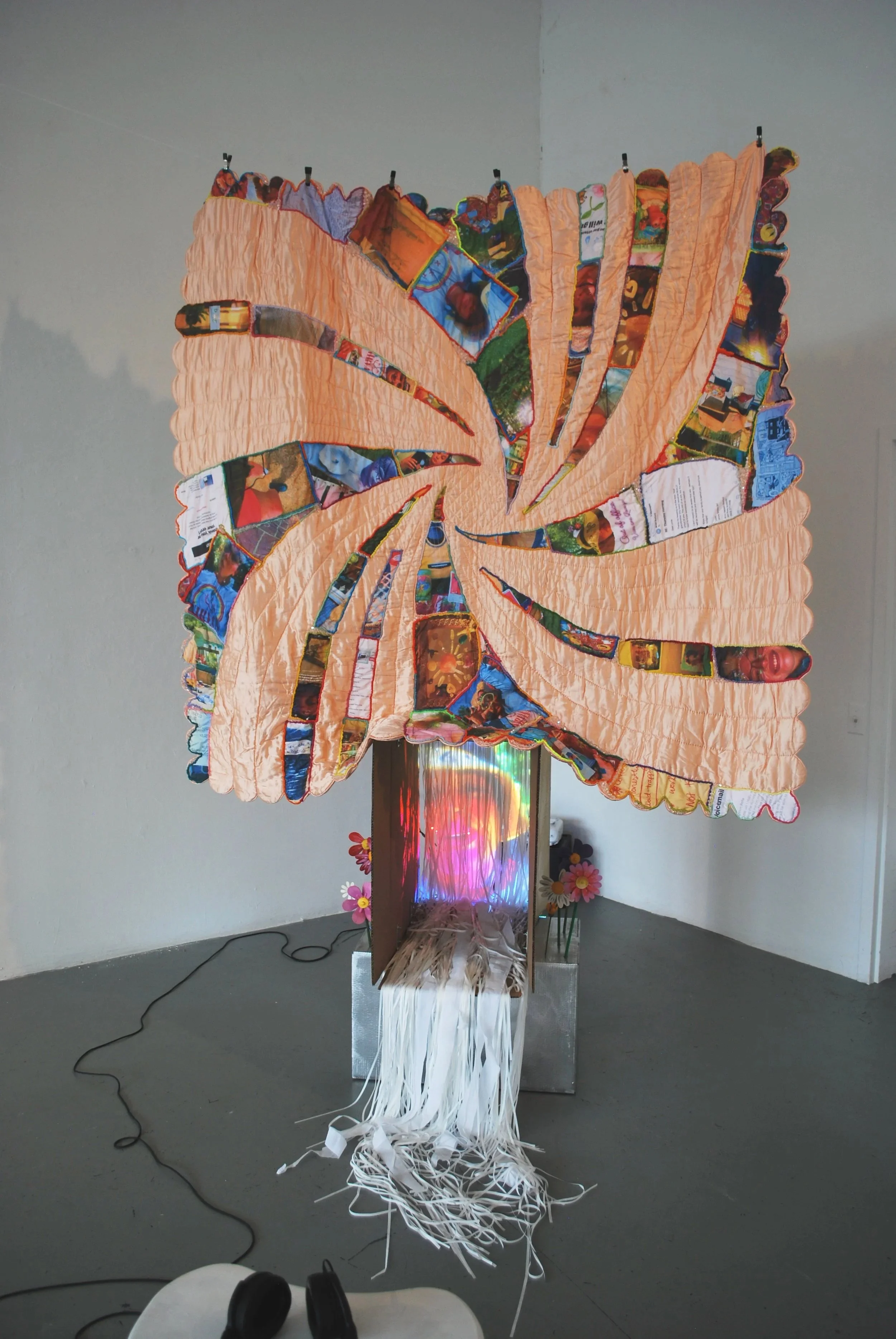 Multimedia installation Party/Monster by Lauren Be Dear featuring layered textiles, projection, and fragmented self-portrait imagery.