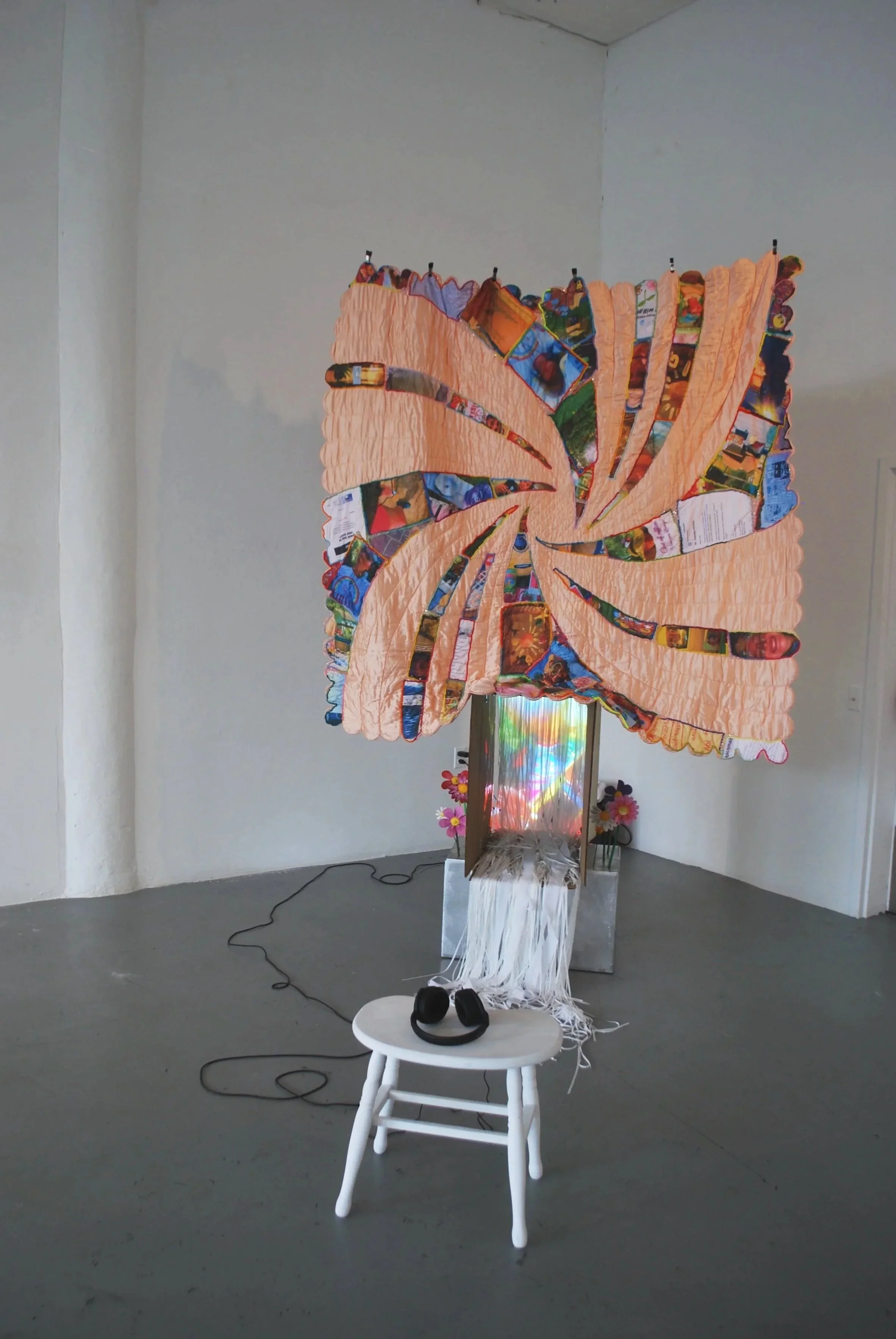Installation view of Party/Monster featuring immersive projection, quilted materials, and sculptural textile forms.