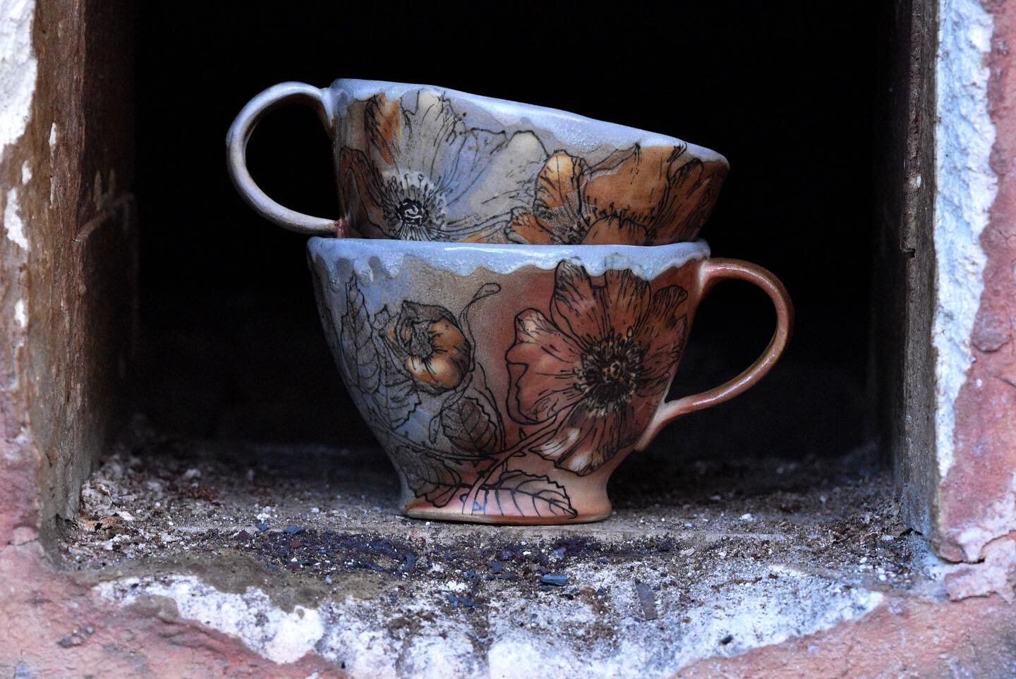 Woodfired Pinched Teacups with Wild Roses (photos of Coneflower &amp; Monarch Teacups in stories, if you want to check those out&hellip;)

These photos were taken in the opening of the firebox to our wood kiln. This is where the wood gets added to fe