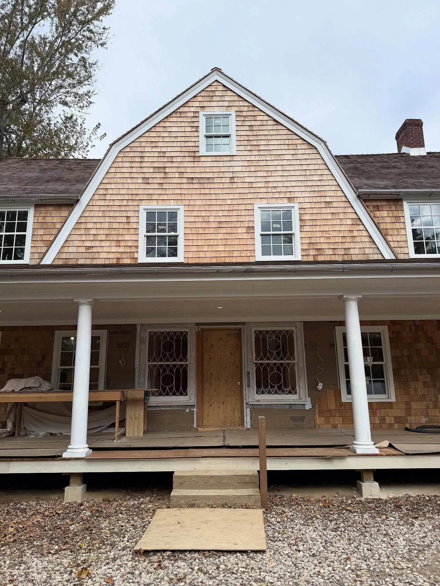 Some fun exterior progress in East Hampton.  To this day I still cannot believe the original columns on the front porch were not centered on the door - sheesh!  Small changes for big impact always.