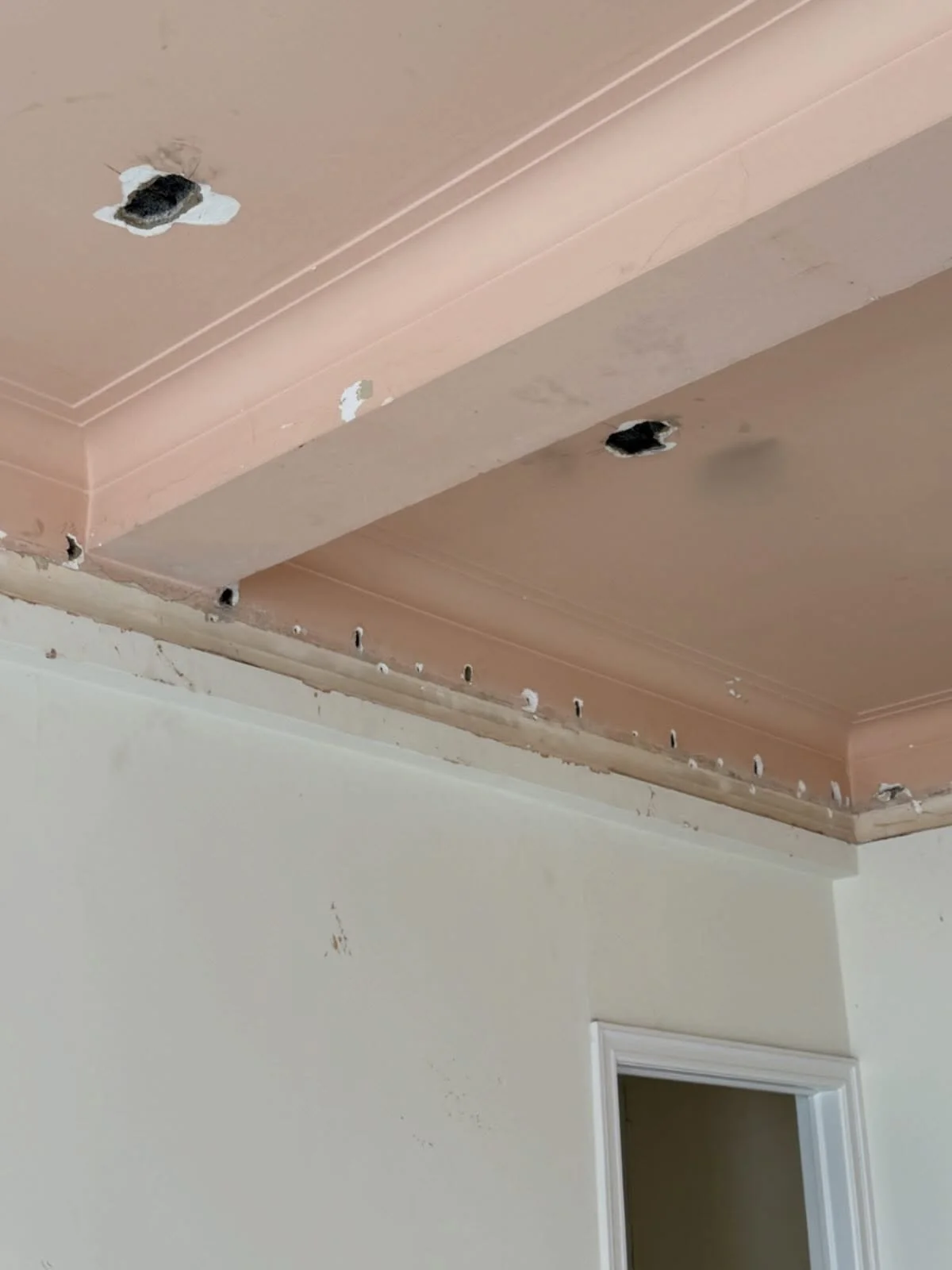 Original beams and plaster crown, both hidden beneath ugly dropped ceilings at our Madison Avenue project.  The pink is going to go&hellip; #uppereastside #gutrenovation #prewarapartment