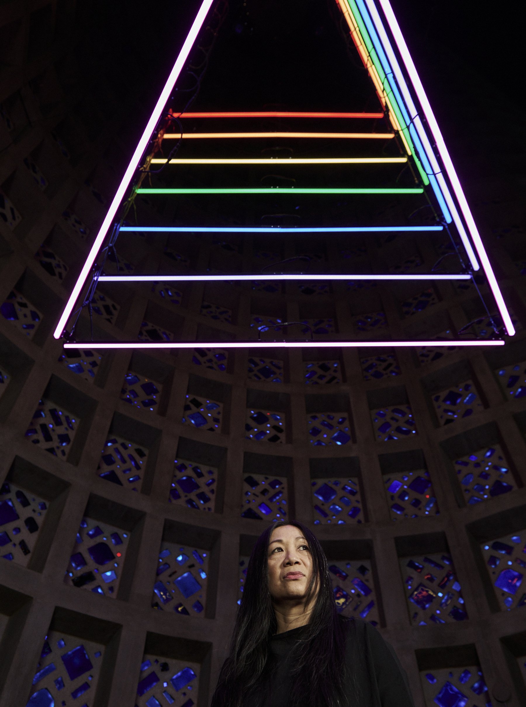  Artist CHiKa photographed with her light sculpture installation at the New York Hall of Science. 