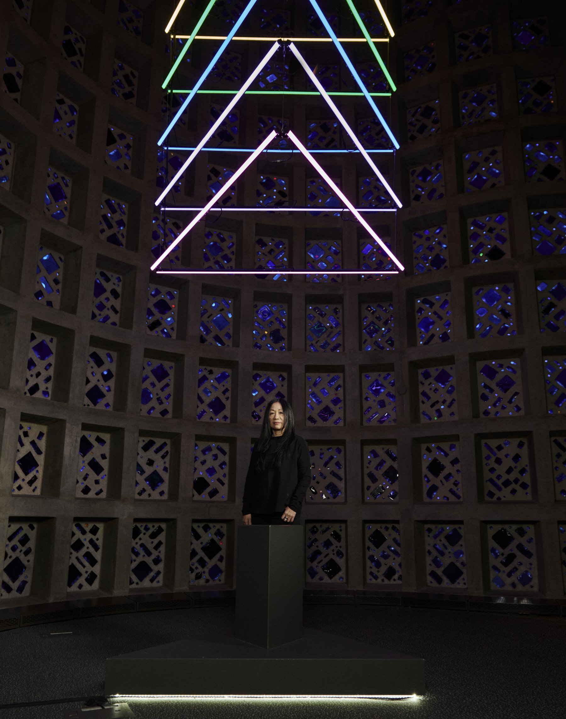  Artist CHiKa photographed with her light sculpture installation at the New York Hall of Science. 