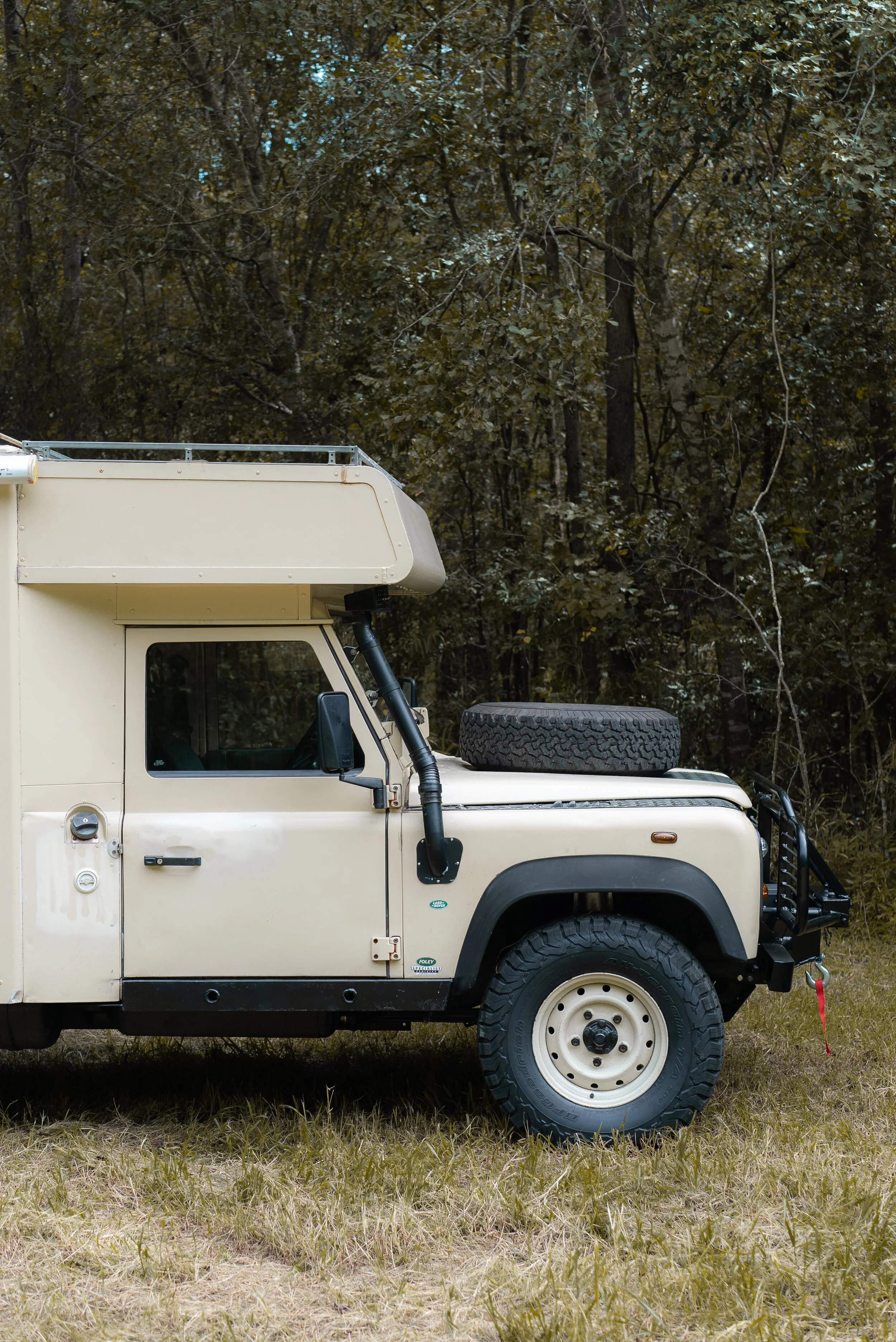 1990 Defender 130 Overland Camper — Osprey Custom Cars