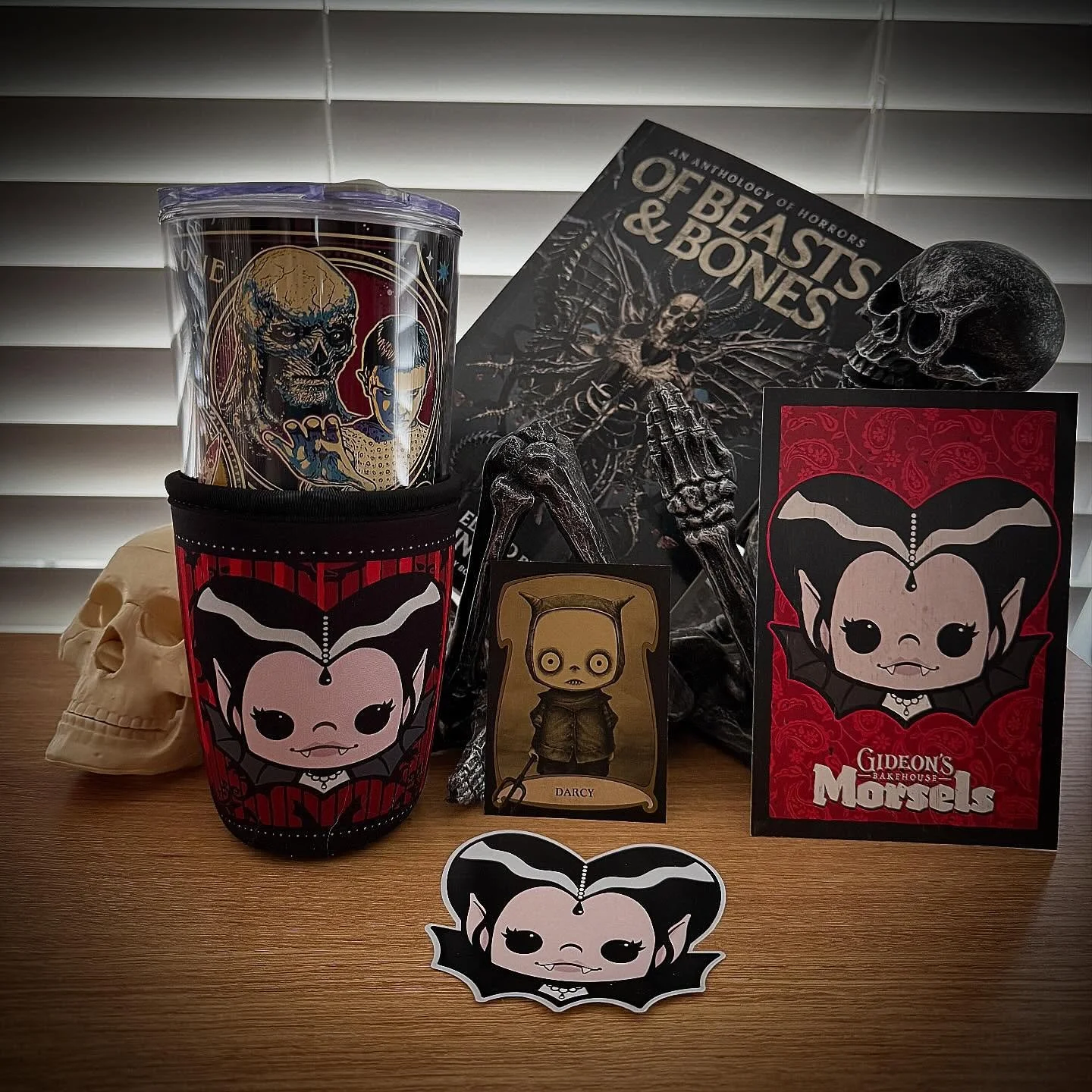 I got some cute @gideonsbakehouse merch in the mail for Mother&rsquo;s Day from my daughter. I think they fit perfectly with my #hhn cup and Mr. Skeleton holding his fav book Of Beasts &amp; Bones! It&rsquo;s good to keep all of the monsters together