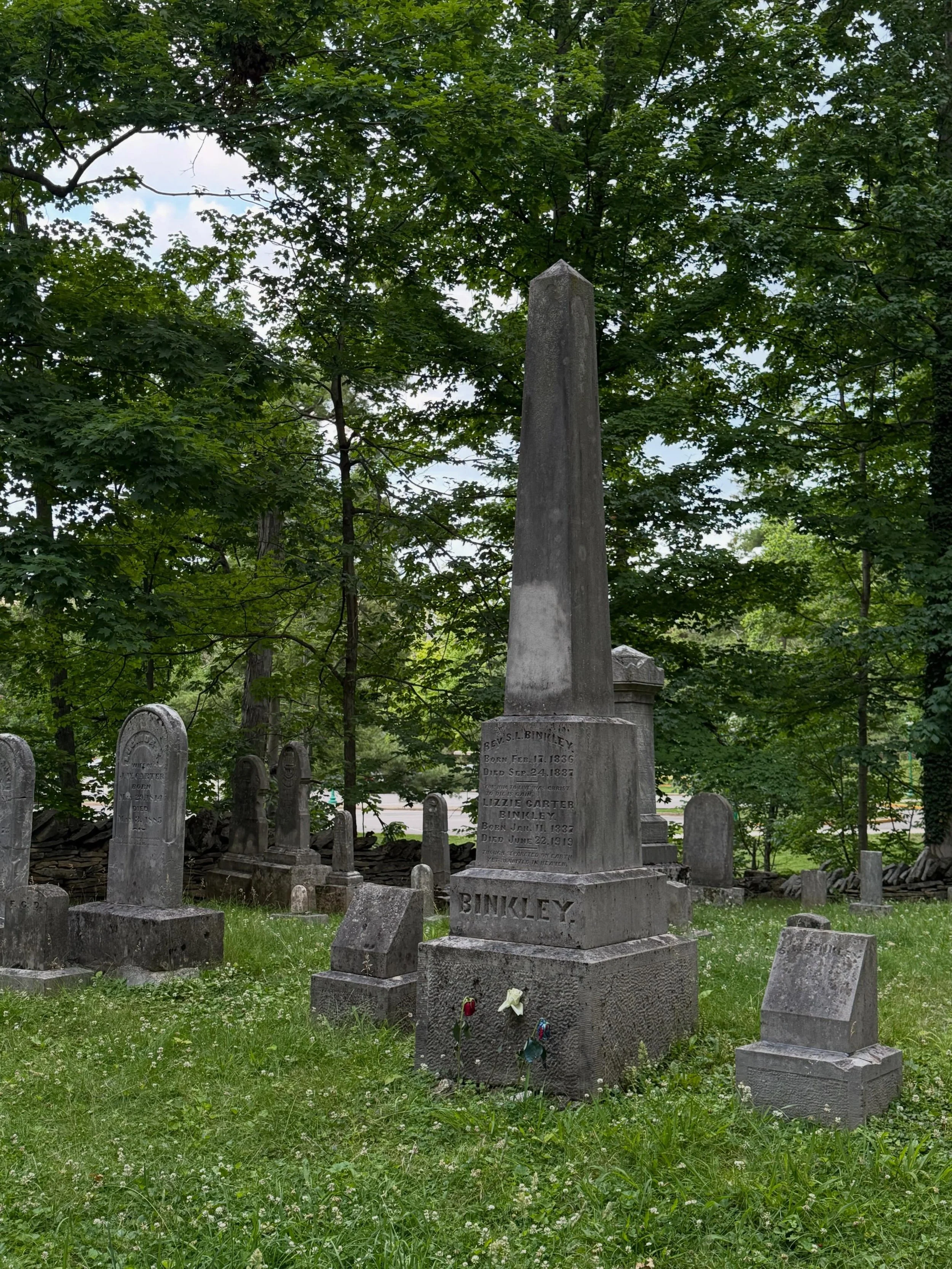 Quick campus walk when I got back in town this evening. I spotted the flowers and the bouquet in the cemetery and noticed one of the gravestones looked like it had been broken at some point. I love strolling past the trees and the river on a beautifu