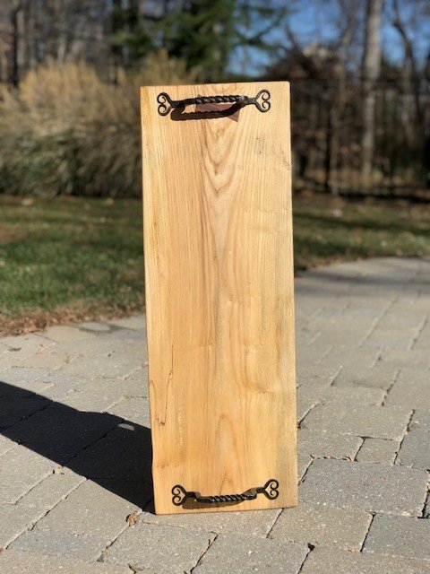 Description: As h Serving board with black handles. 30"L x 10"W
Price: $50
