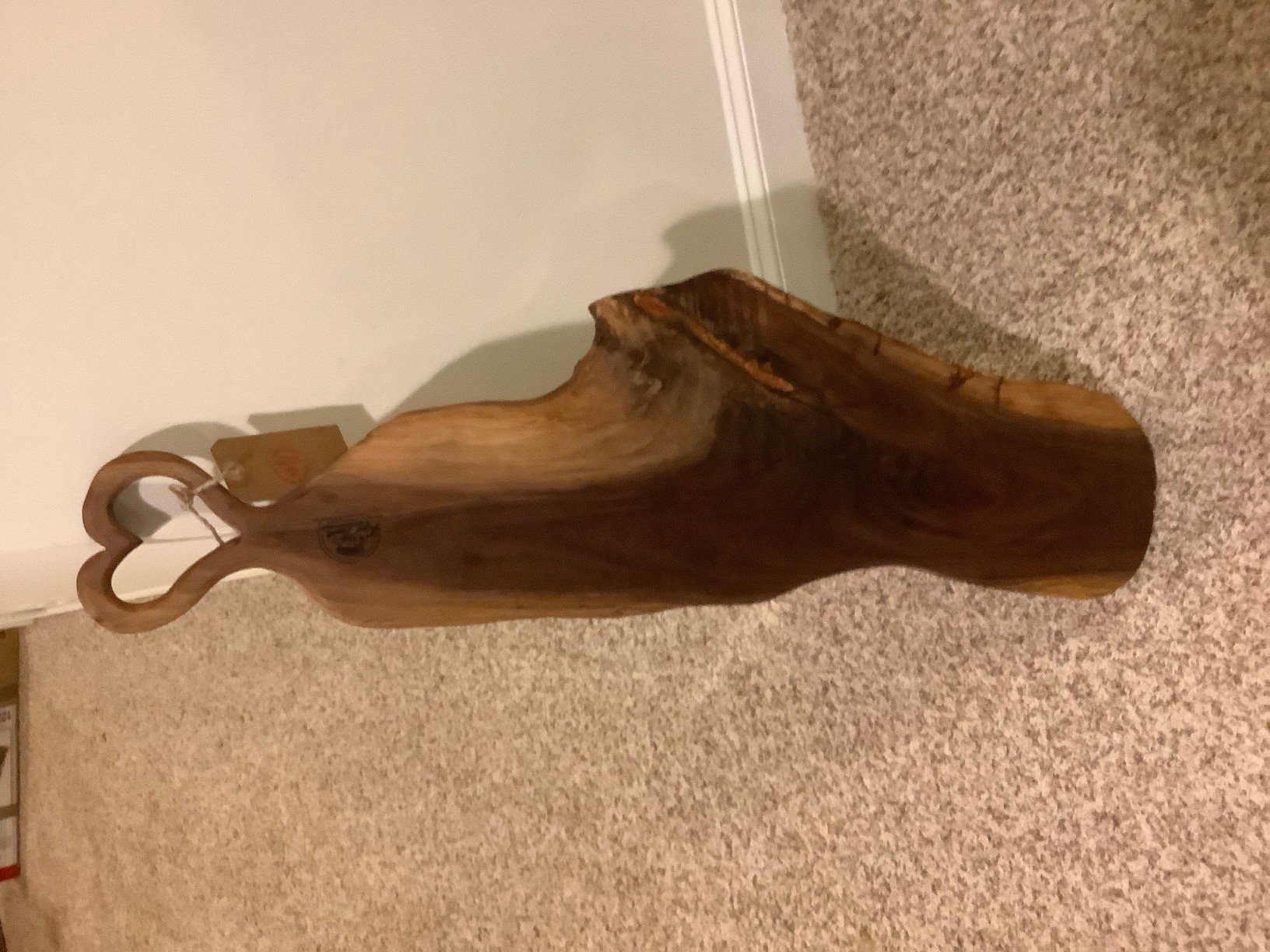 Description: Black Walnut charcuterie board with gold Epoxy accents and Heart handle. 38" Long
Price: $130