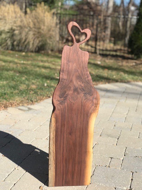 Description: Black Walnut charcuterie board with Heart handle. 37" Long
Price: $110