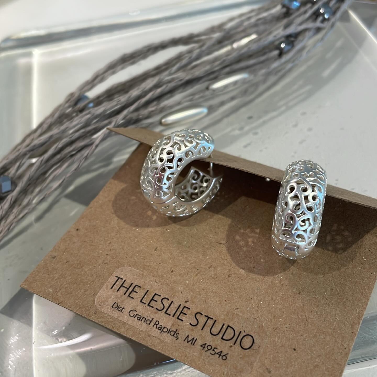 We love a good accessory combo- hoop earrings + magnetic bracelet makes the outfit!