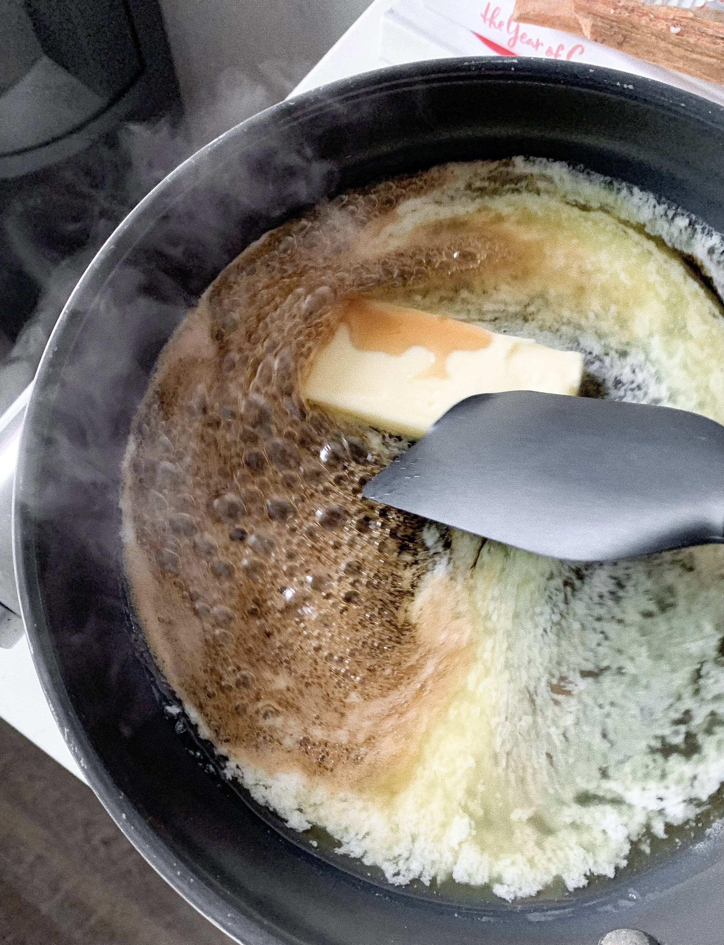 Melting the butter with the maple syrup in a saucepan