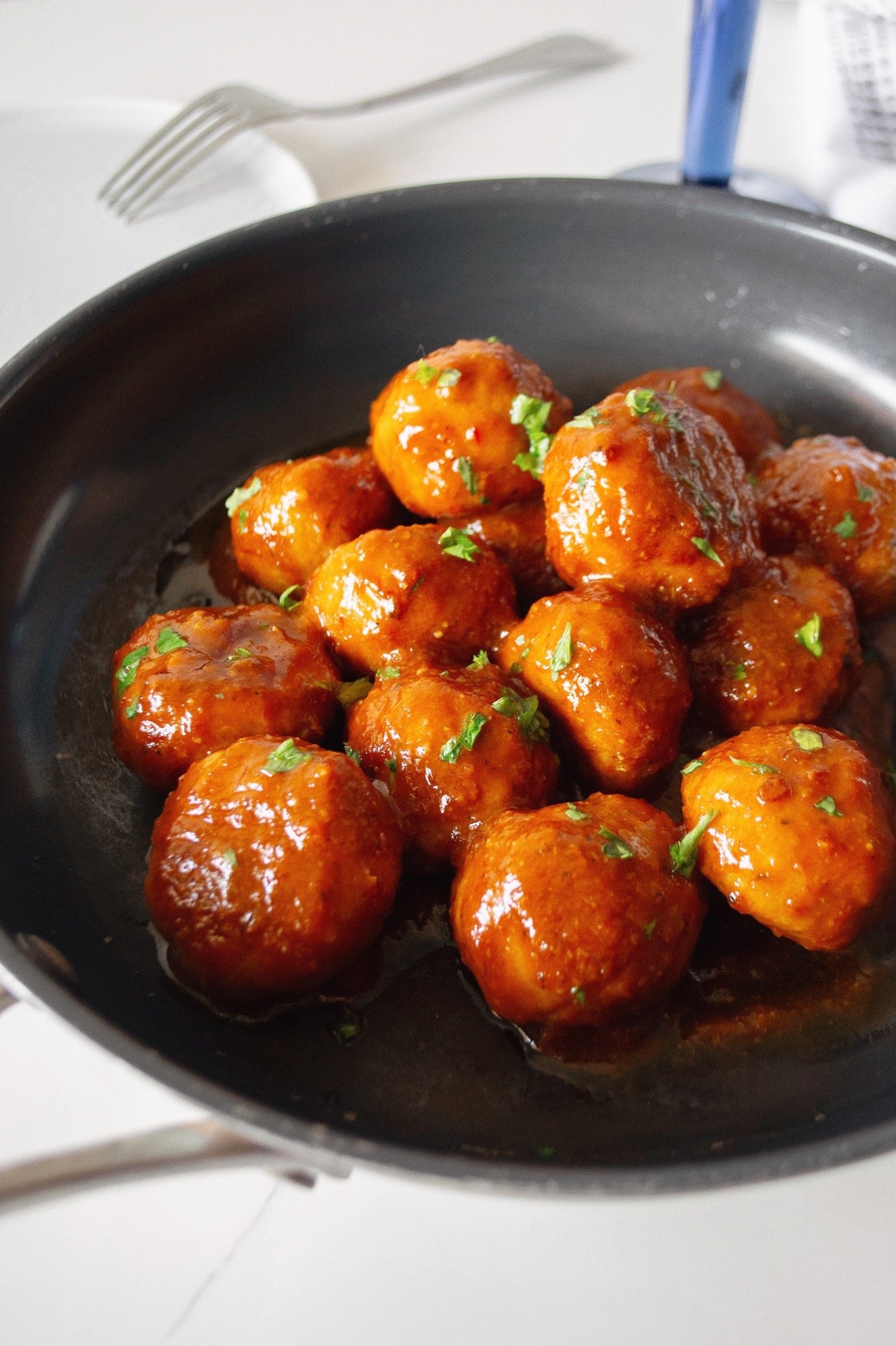 uicy Oven-Baked Honey Chipotle Chicken Meatballs in pan