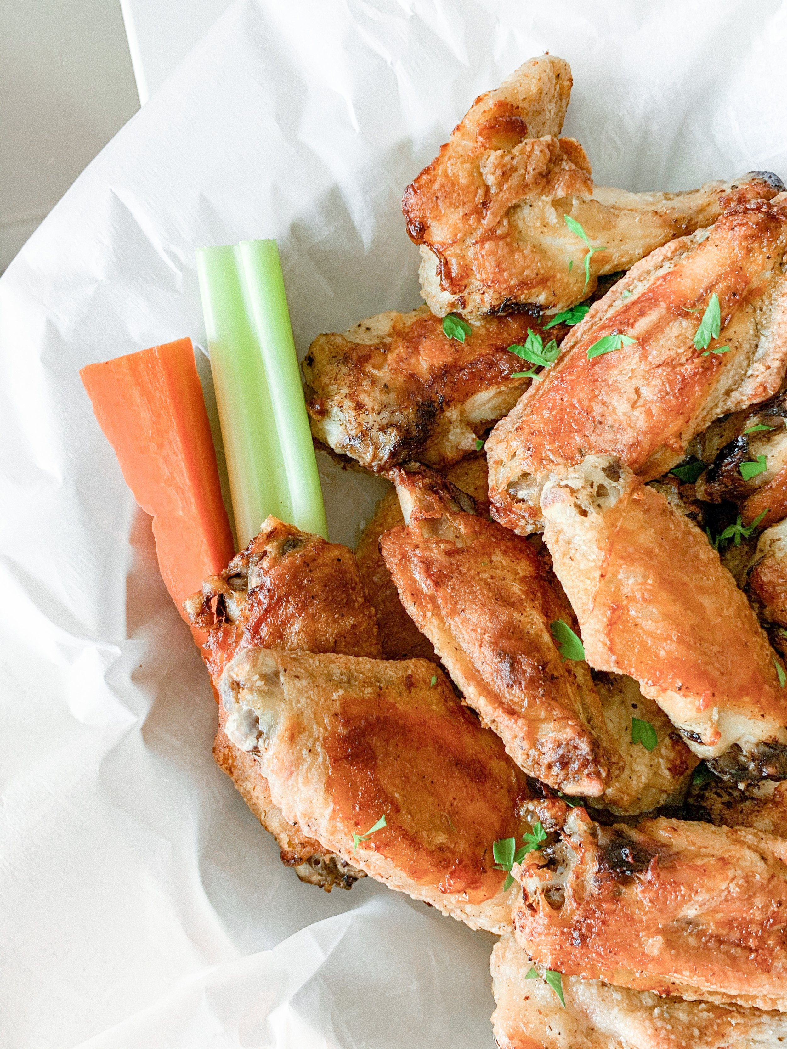 Crispy Oven-Baked Chicken Wings with carrots and celery