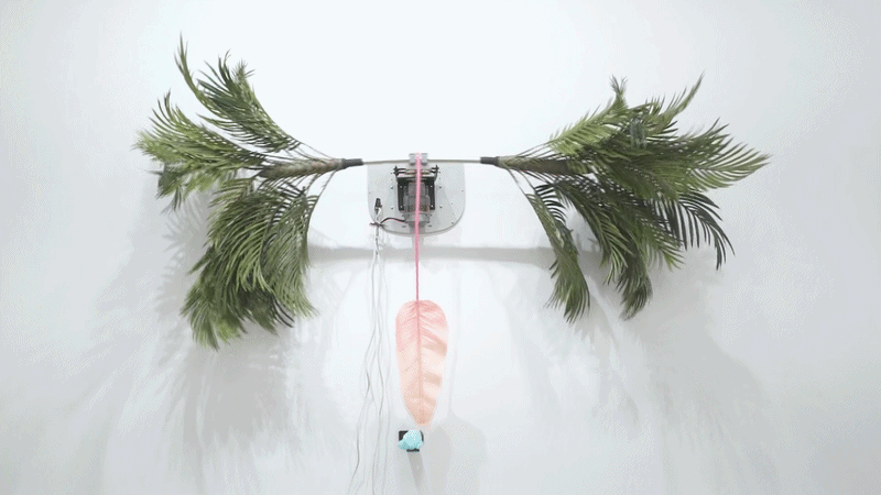 Rachel Youn,  Trampled Underfoot,  2022, Chi swing, aluminum, artificial plants, steel, stretch tape, slag glass, 53 x 75 x 20 in.