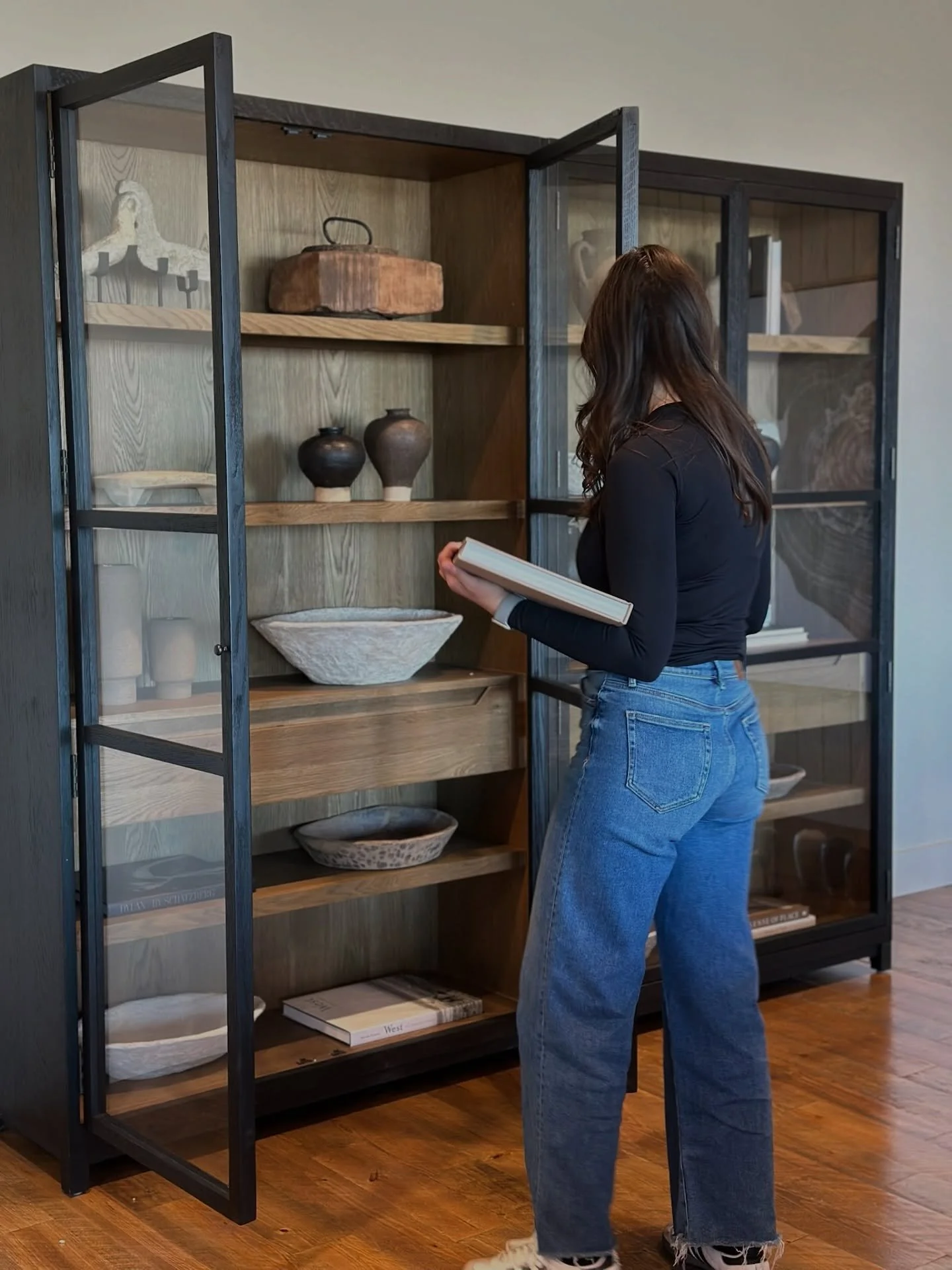 Well-chosen accessories can completely shift the tone of your home.

Thoughtfully selected art, vases, bowls, candles, rugs, and pillows add warmth and dimension, making your space feel holiday ready. This carousel highlights our use of accessories f