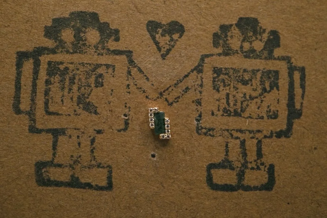 New items unlocked‼️ 
We got a restock of some fun solid Gold ends from Ember, Tether, and Regalia✨ 
Featuring new designs such as &ldquo;Meld&rdquo; with Moss Agate surrounded by CZ stones from Ember. Along with some familiar designs like &ldquo;Gam