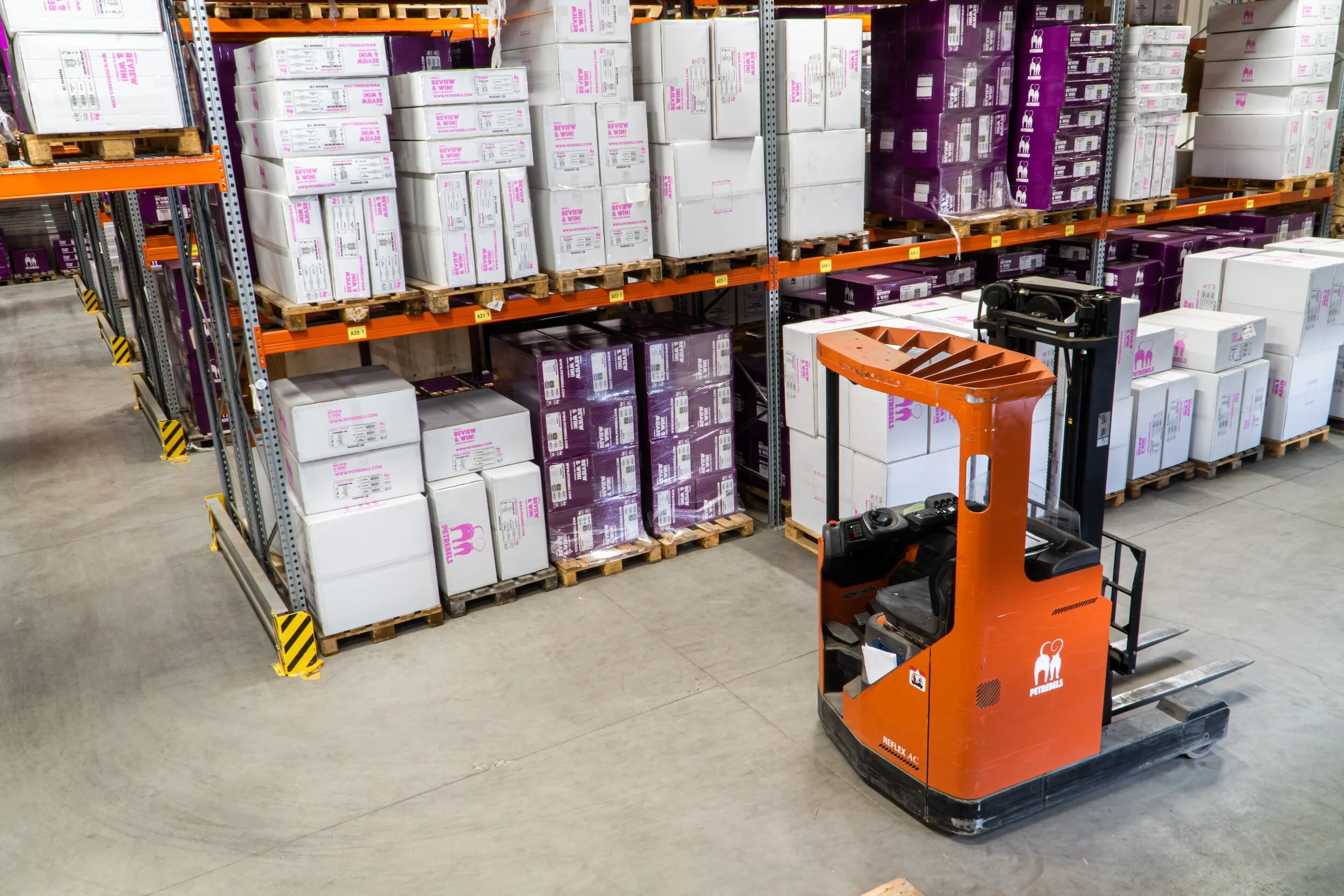 Warehouse racks and pallets with forklift