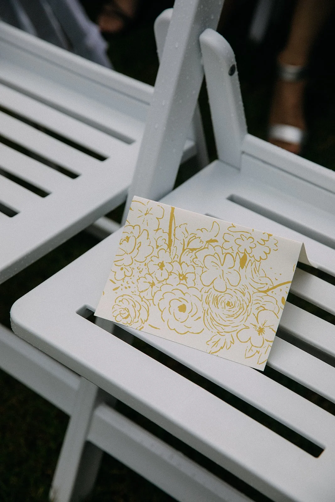 Hand Drawn Floral Cards at Ceremony Seats.jpg