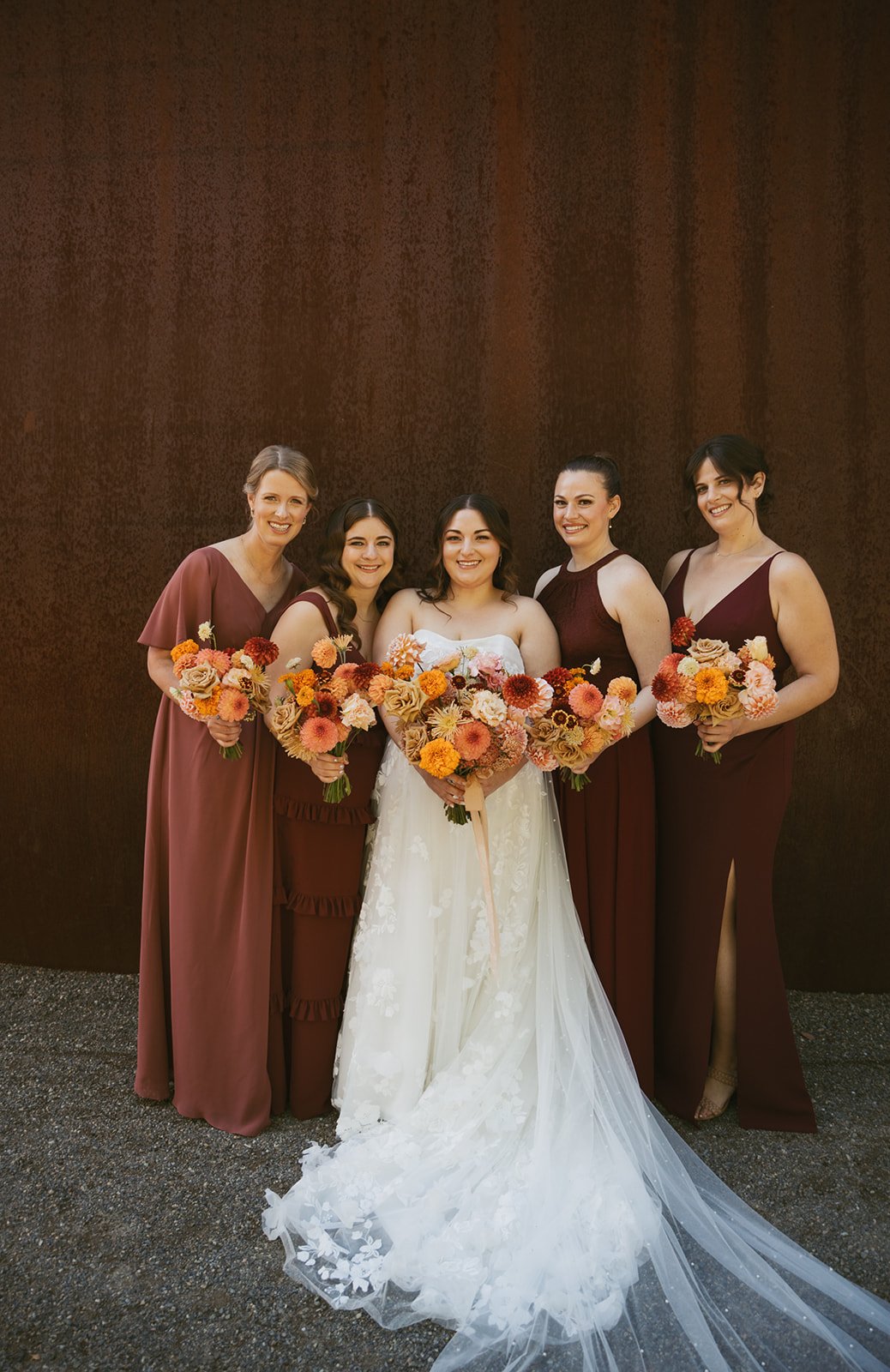 Olympic Sculpture Park Wedding - Bride and Bridesmaids Holding Colorful Bouquets.jpg