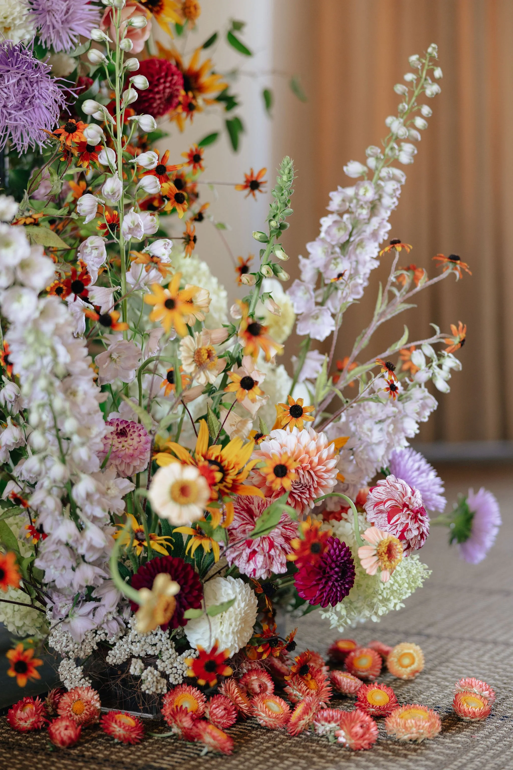 Colorful Grounded Floral Arrangement in a Pastel Bright Palette.jpeg
