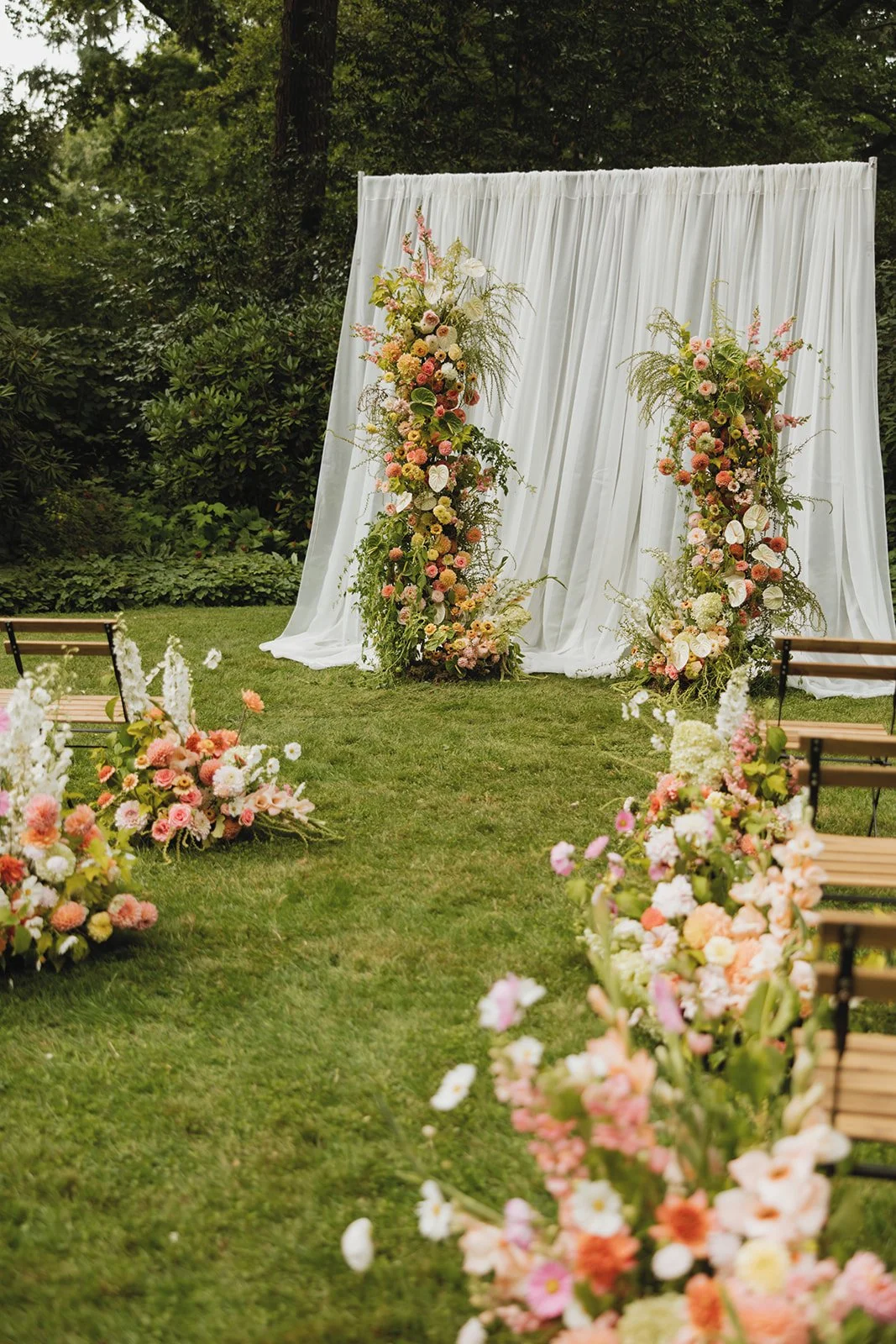 Intimate Washington Wedding Ceremony - Featuring Whimsical Arch Floral Arrangements.jpg