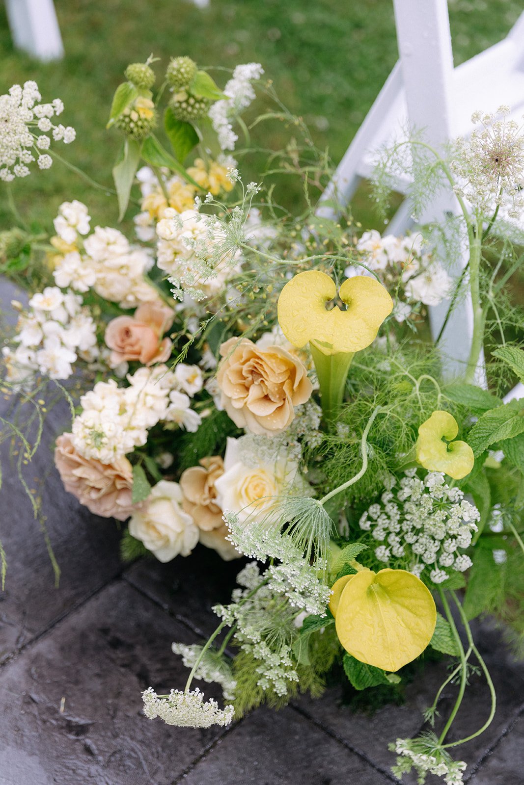 Grounded Ceremony Floral Arrangement in Chartreuse, Cream, and Taupe Palette.jpg