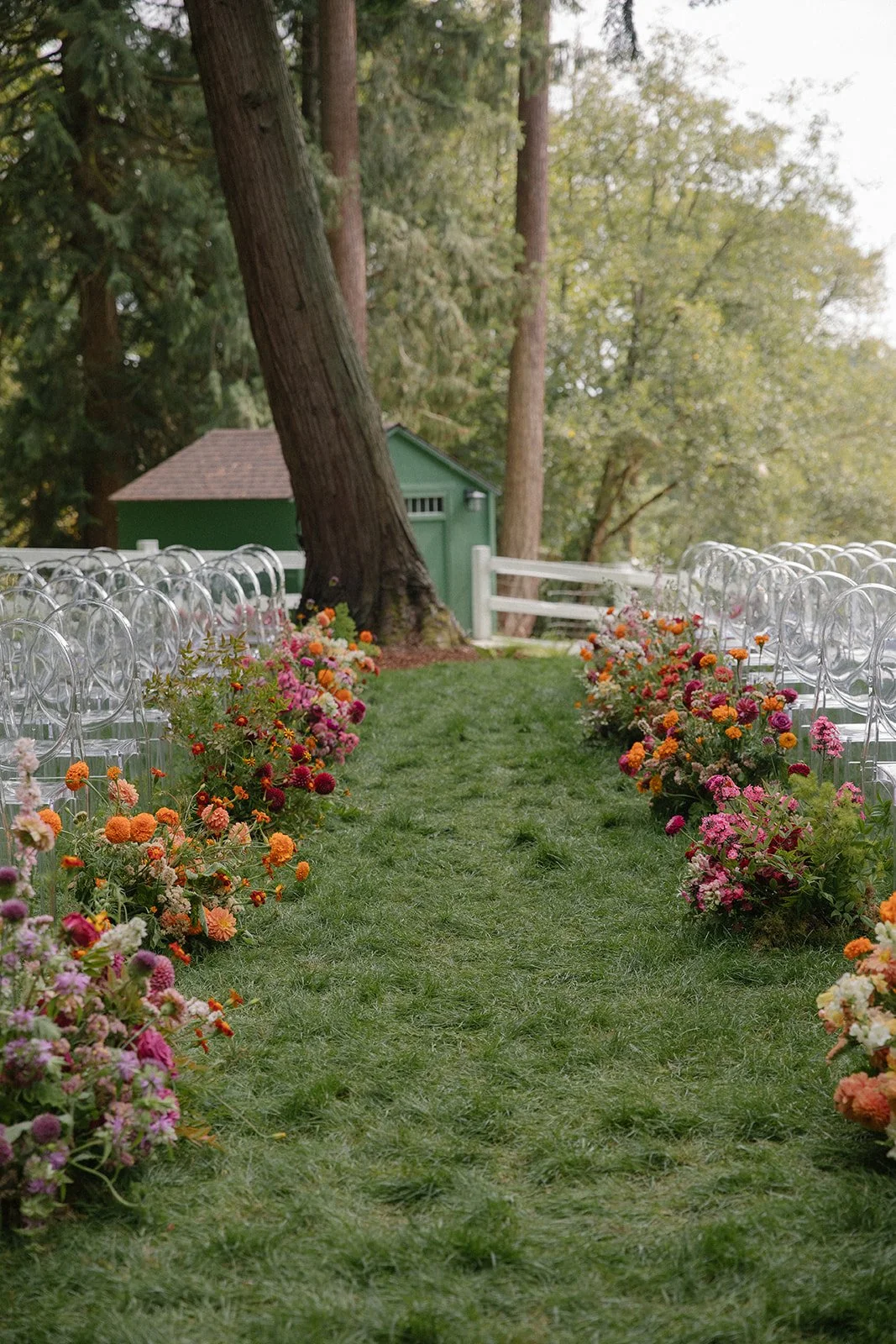 Bright and Joyful Aisle Flowers at an Outdoor Wedding in Woodinville Washington.jpeg