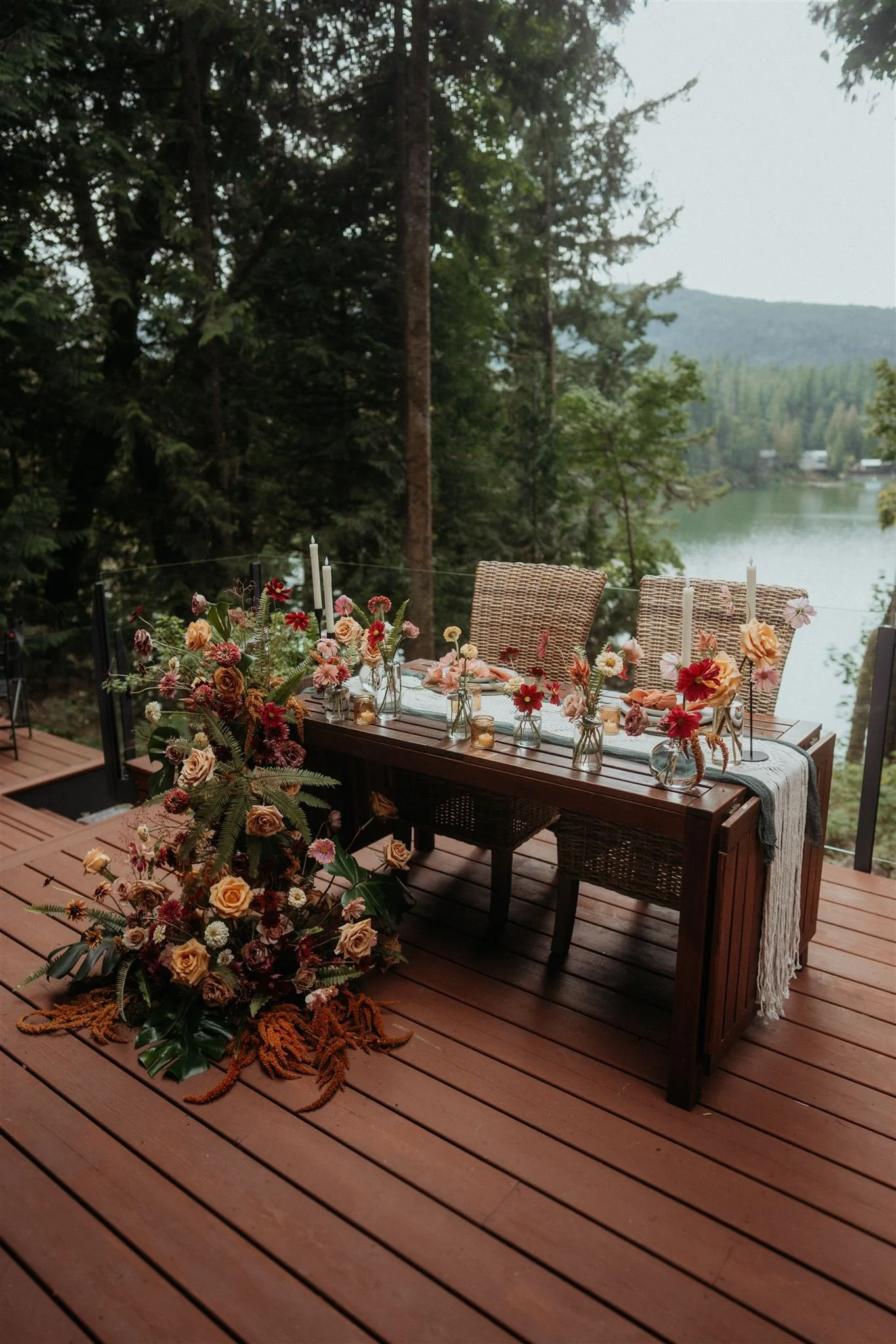 Autumnal Floral Installation - Featuring Monstera Leaves and Toffee Roses.jpeg