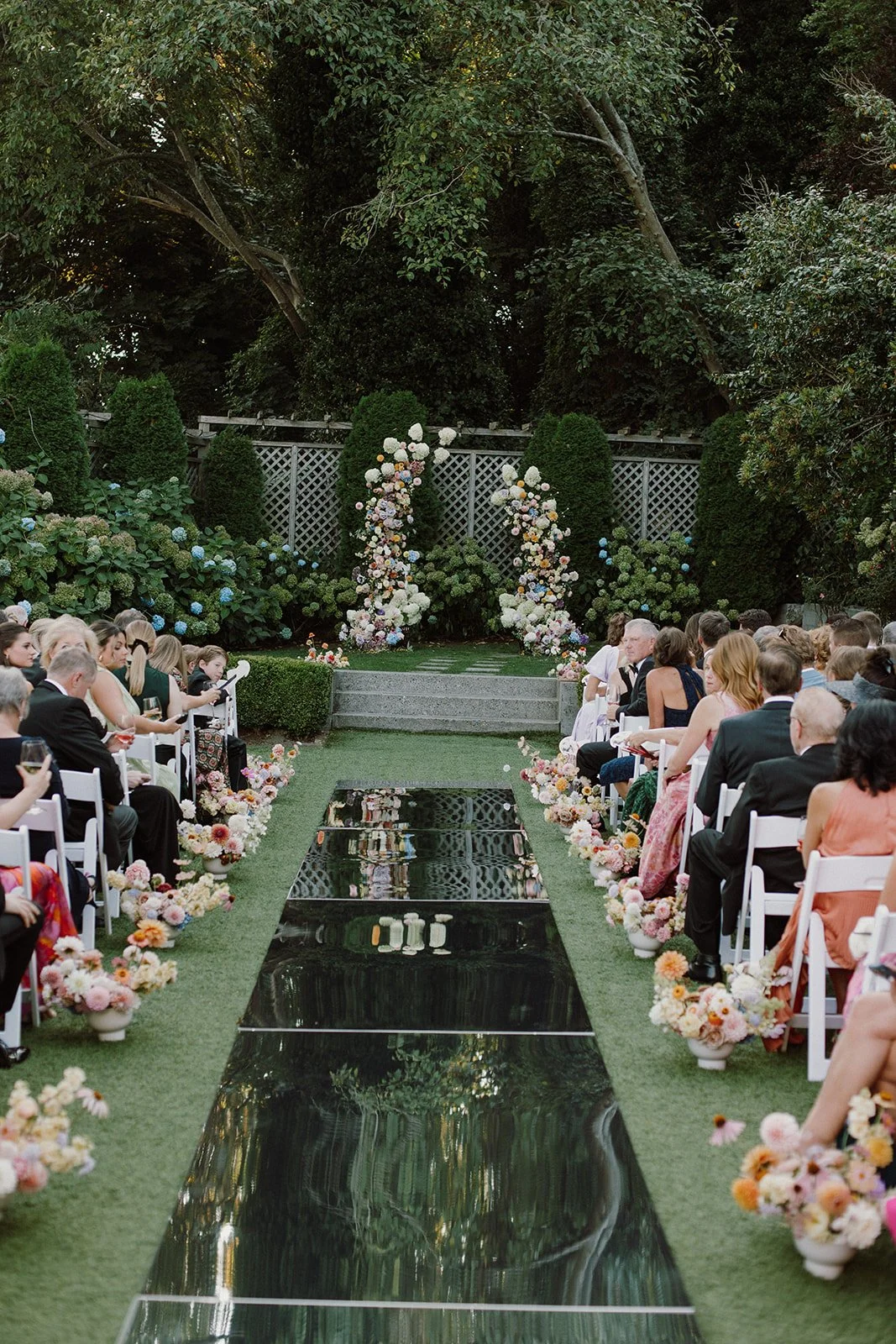 Pastel Garden Party Ceremony Floral Arrangements.jpeg