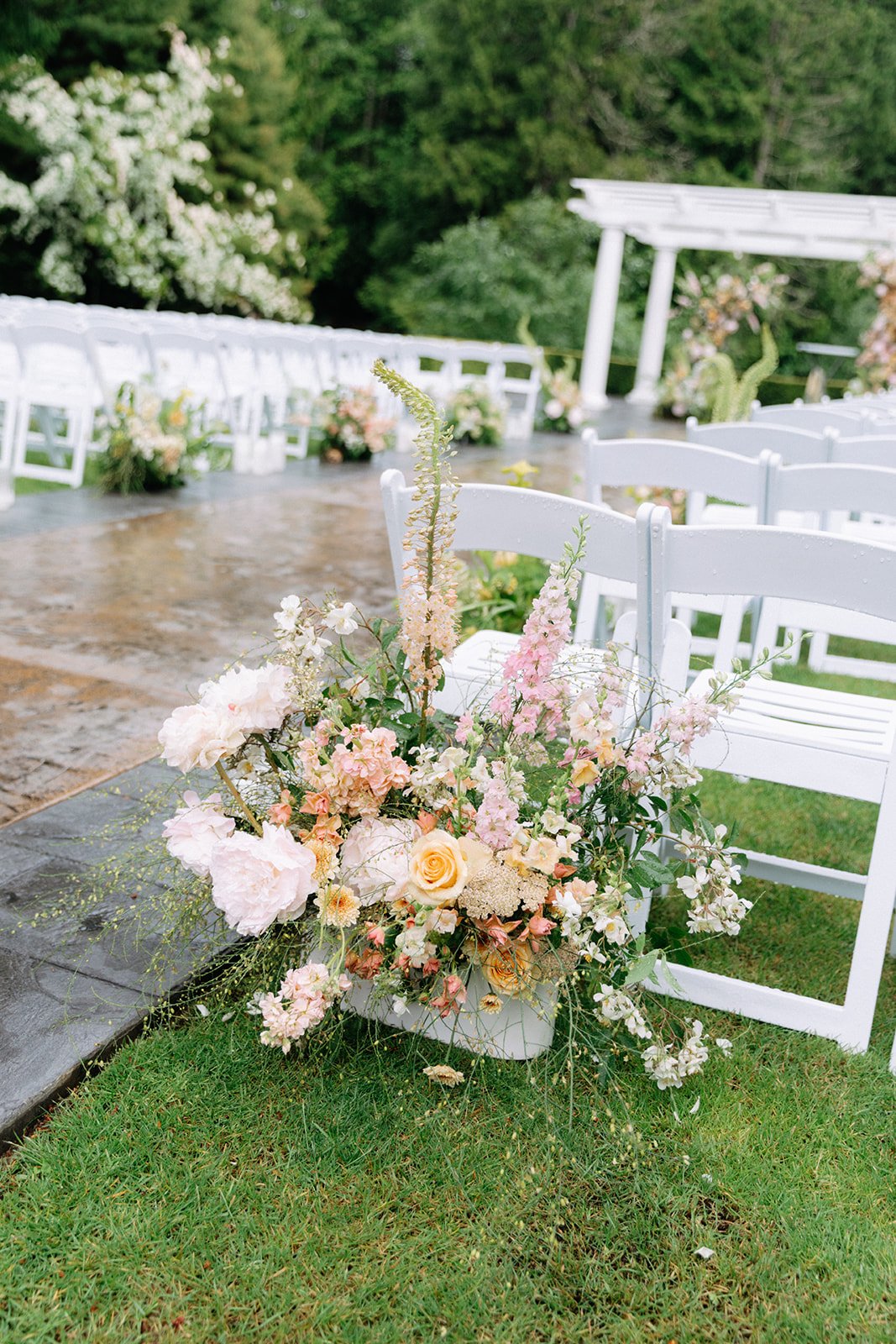 Grounded Aisle Entrance Arrangement in Soft Pinks and Greens.jpg